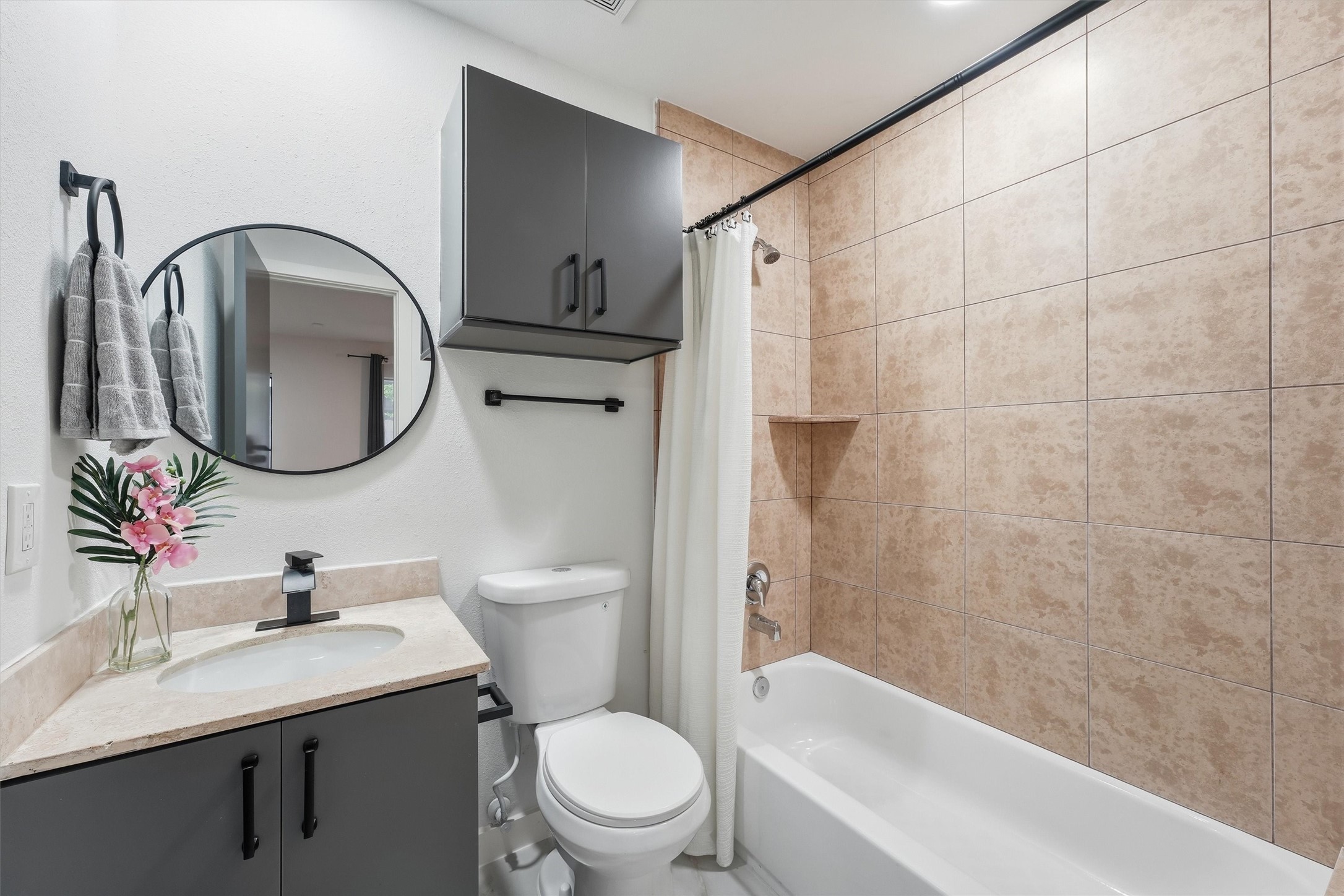 Ensuite bath on the first floor with shower/tub combo and low flow toilet.