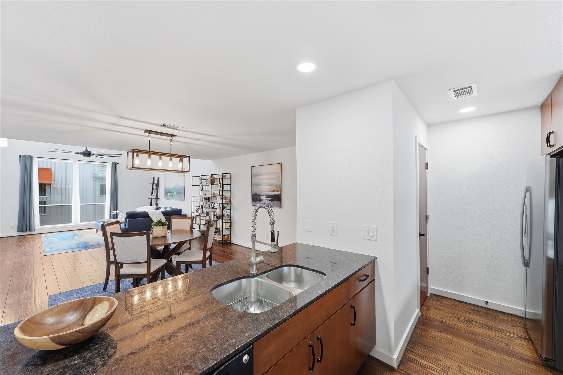 Light and bright. You'll find the perfect space to host your friends and family in this spacious second floor open-concept living/dining/kitchen