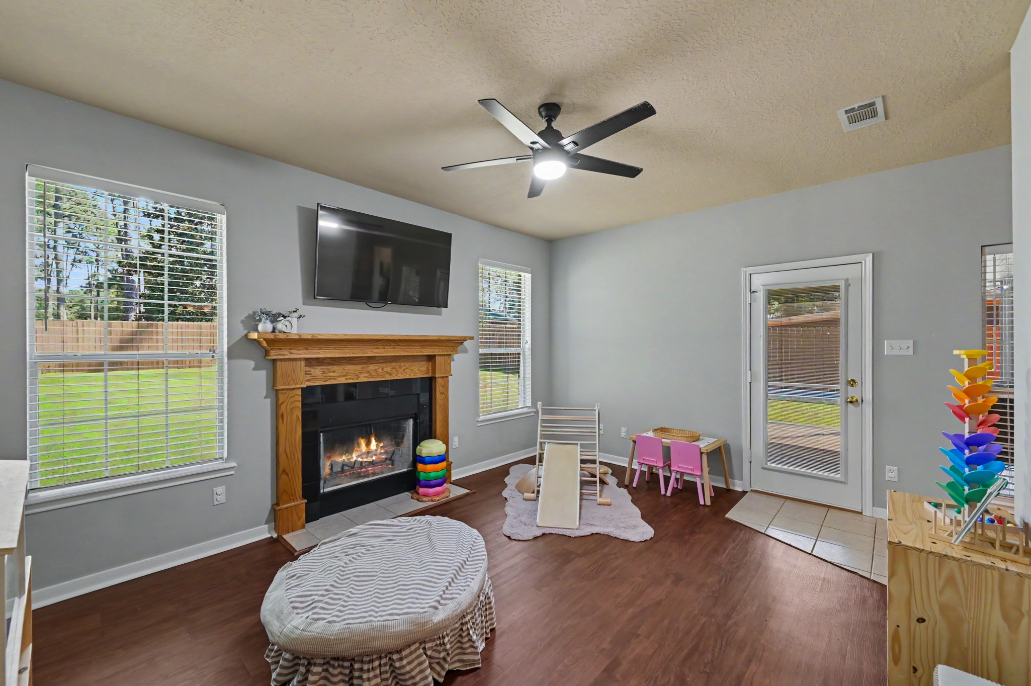 Secondary living room with wood fireplace
