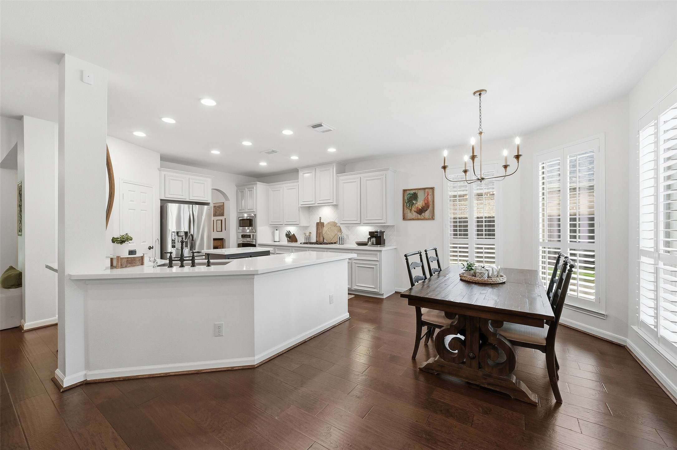 This breakfast area can accomodate a large dining table.