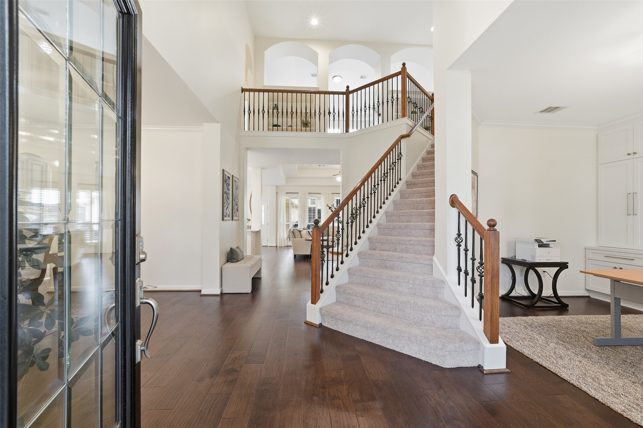 Upon entering the front door you will find a thoughtfully renovated home office to the right and expansive dining room to the left. Upon entering the front door you will find a thoughtfully renovated home office to the right and expansive dining room to the left.