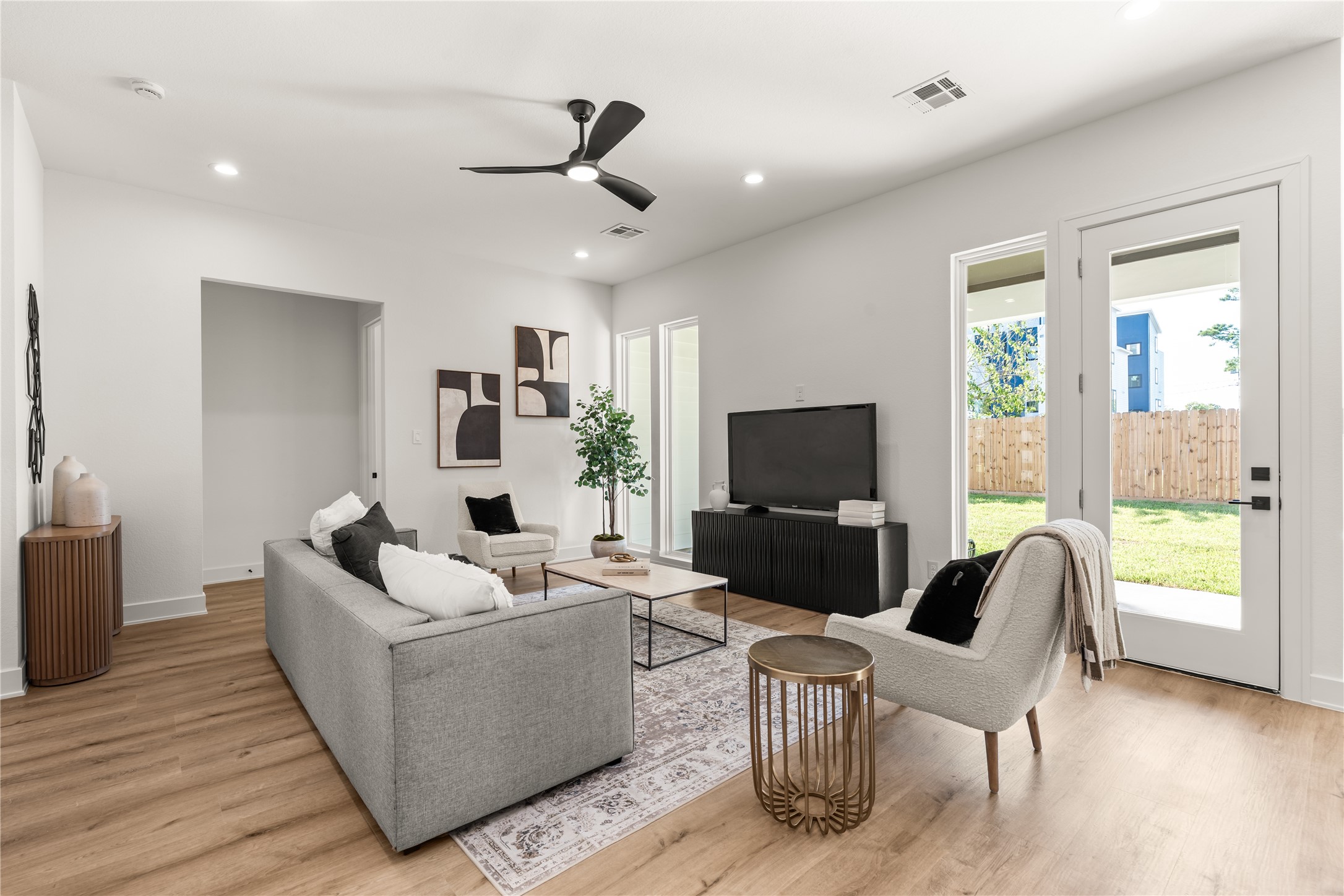 Generously proportioned and thoughtfully arranged, the living room offers ample flexibility for seating configurations without compromising circulation.