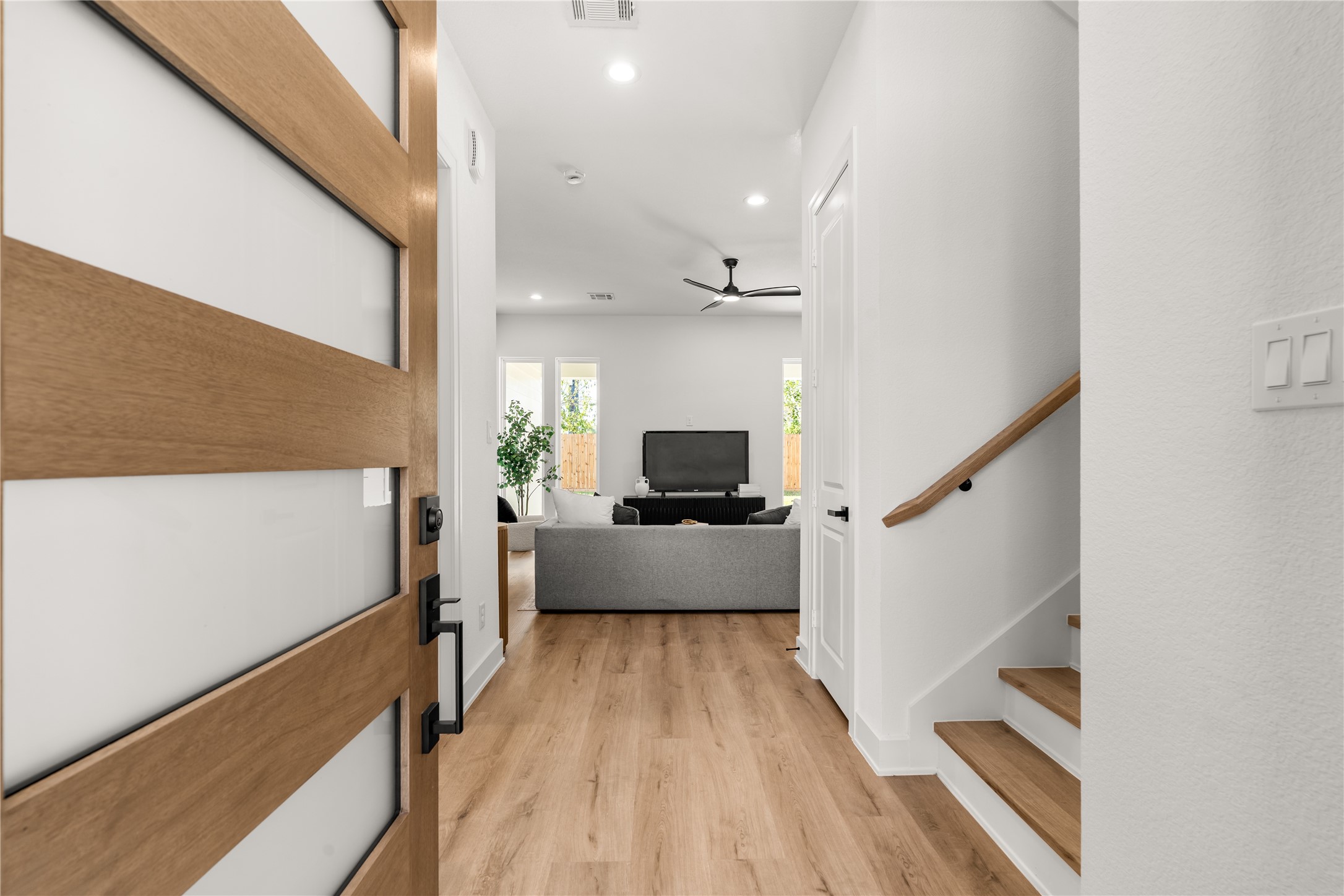 An inviting introduction to the residence, the entryway offers a seamless transition into the main living area.