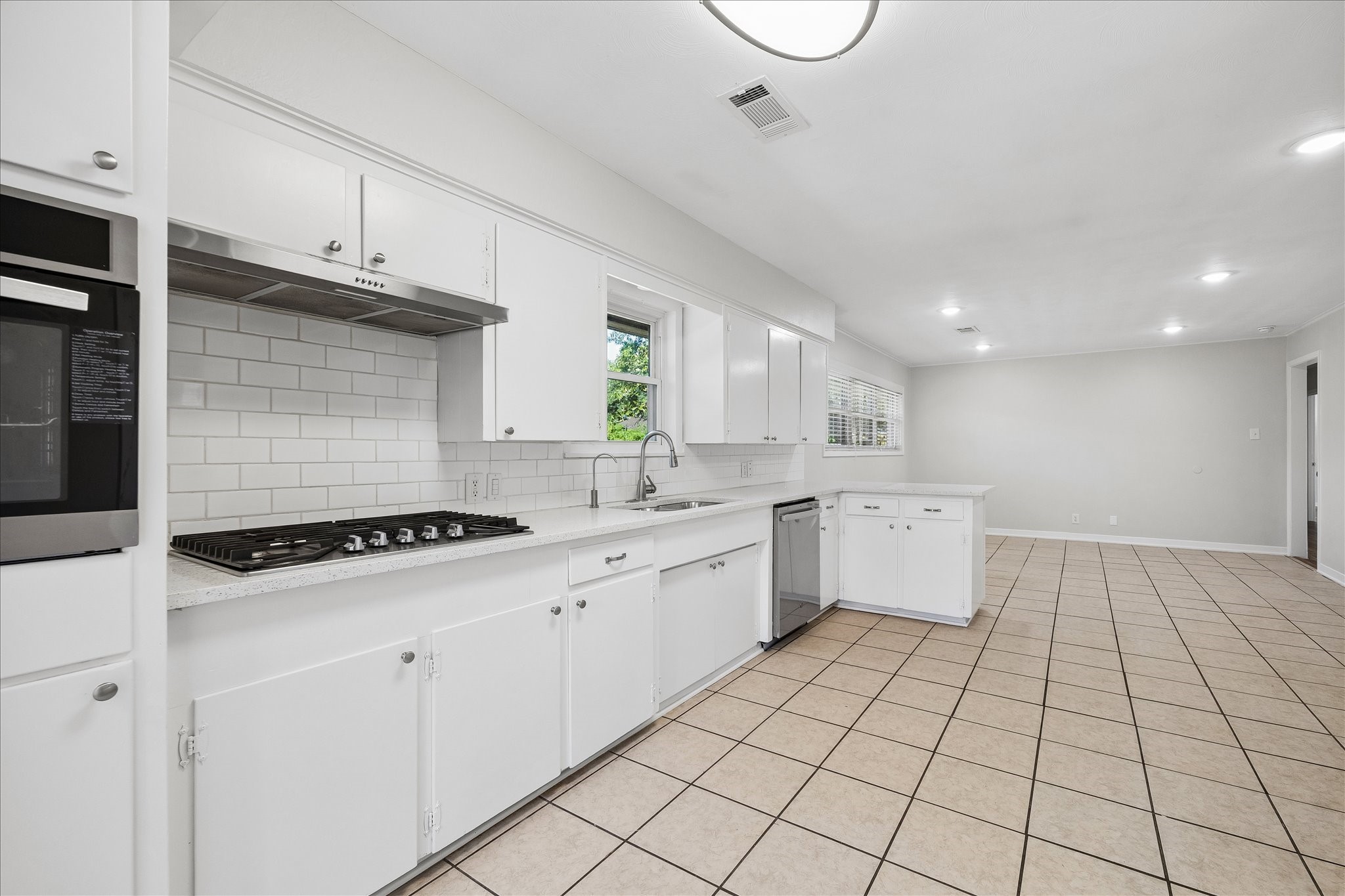 Plenty of cabinet space and a gas cooktop!