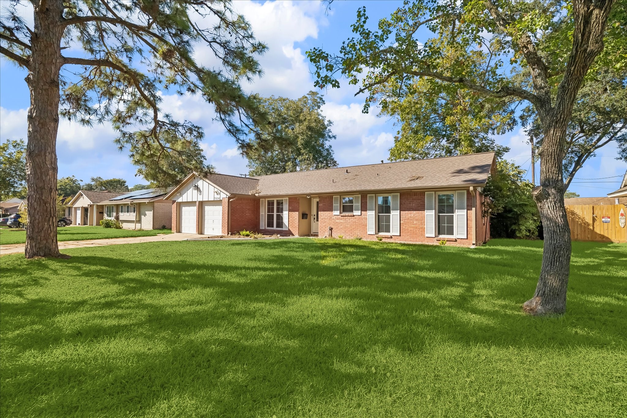 Another view of the front of the home with a nice lot and mature trees. Another view of the front of the home with a nice lot and mature trees.