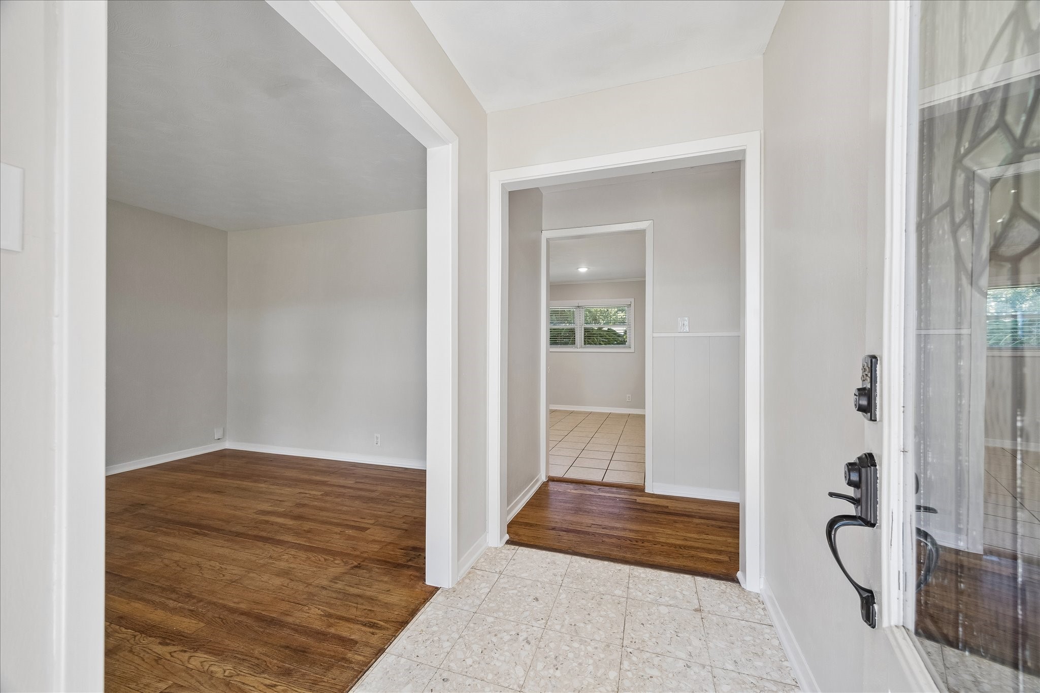 Upon entering the home you will notice the fresh, neutral paint and wood floors. Upon entering the home you will notice the fresh, neutral paint and wood floors.