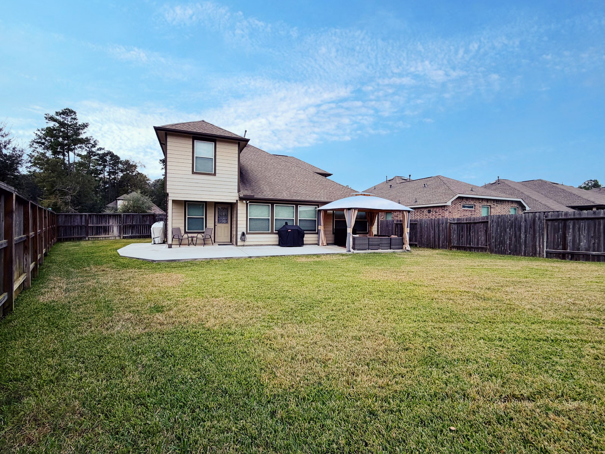 Discover the perfect retreat with this home, featuring an expansive backyard ideal for relaxation and outdoor gatherings.