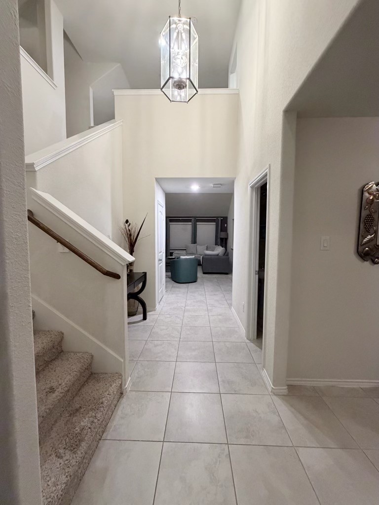 Step into a breathtaking entryway with soaring ceilings that instantly elevate your home's grandeur. Step into a breathtaking entryway with soaring ceilings that instantly elevate your home's grandeur.