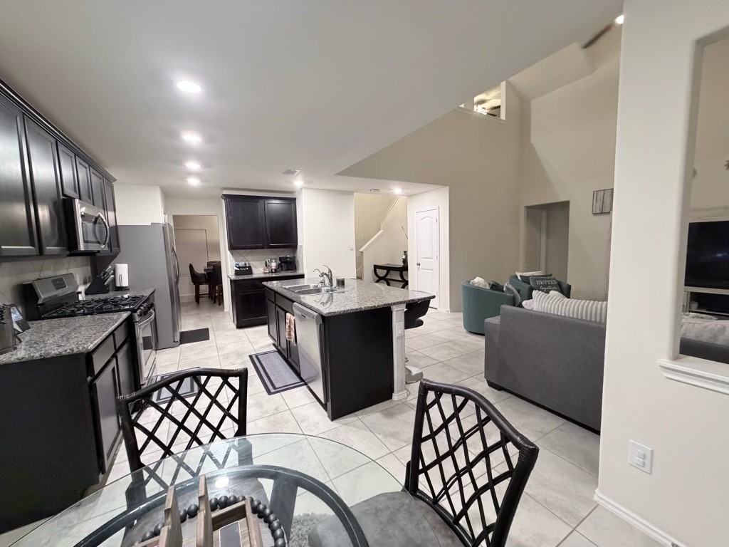 This home boasts an open, spacious design that seamlessly flows from the modern kitchen to the inviting living area, perfect for effortless living and entertaining. This home boasts an open, spacious design that seamlessly flows from the modern kitchen to the inviting living area, perfect for effortless living and entertaining.