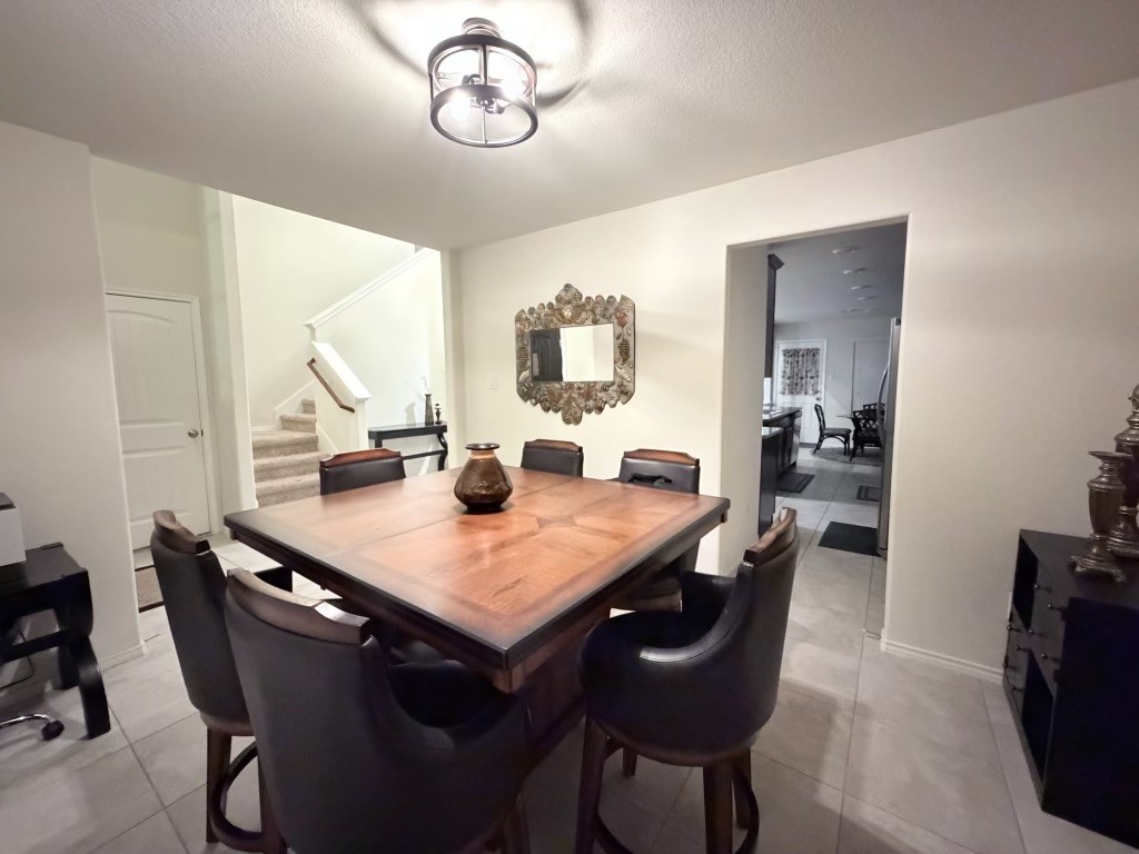 Savor delightful dinners in this inviting dining space, perfect for memorable gatherings and cozy meals. Savor delightful dinners in this inviting dining space, perfect for memorable gatherings and cozy meals.