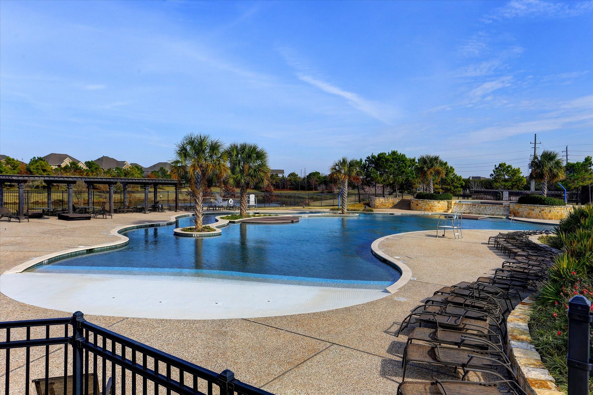 Relax by the resort-style pool with plenty of lounge seating Relax by the resort-style pool with plenty of lounge seating