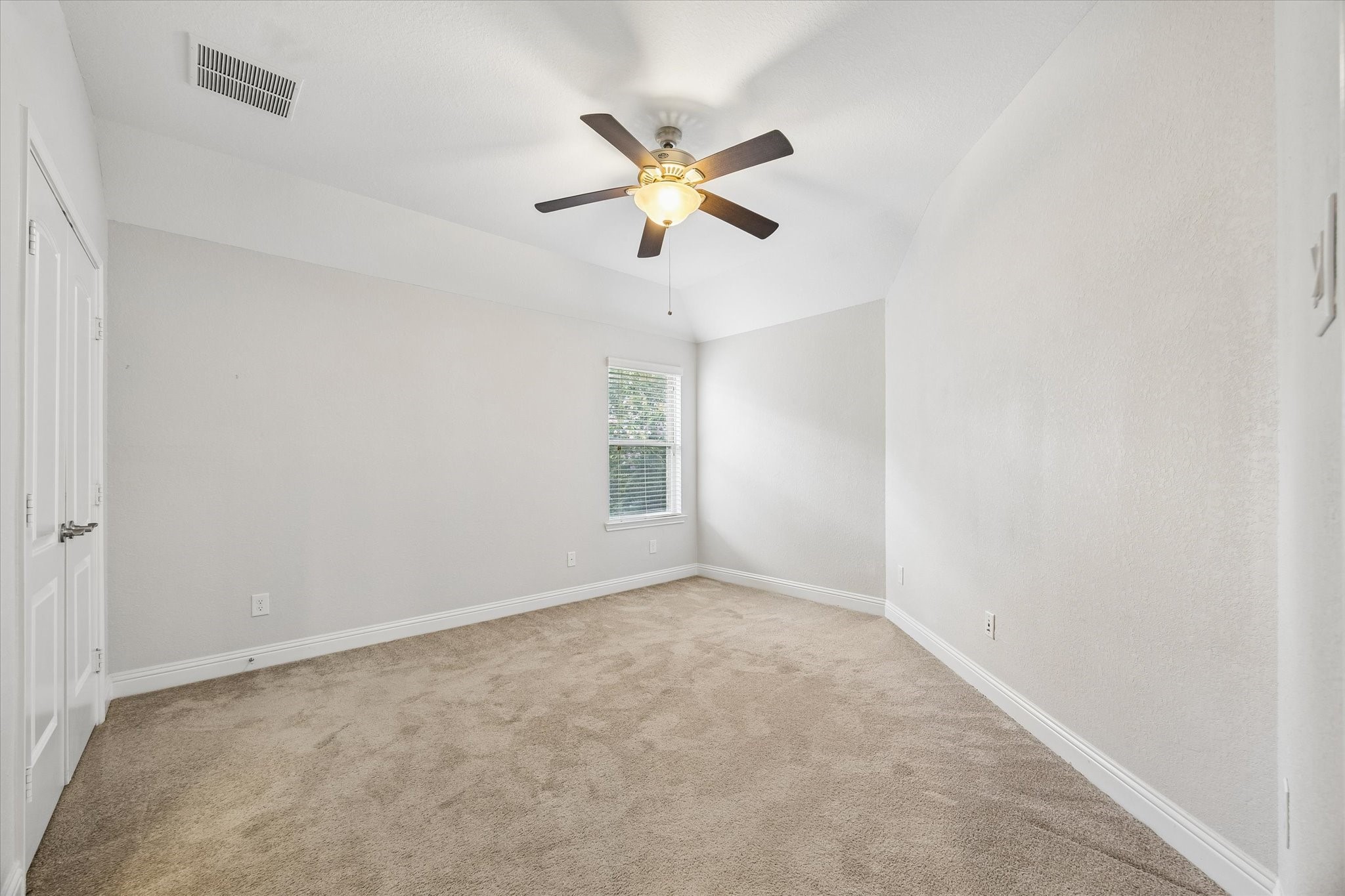 Fourth Bedroom  Comfortable bedroom offering flexibility for guests or a home office