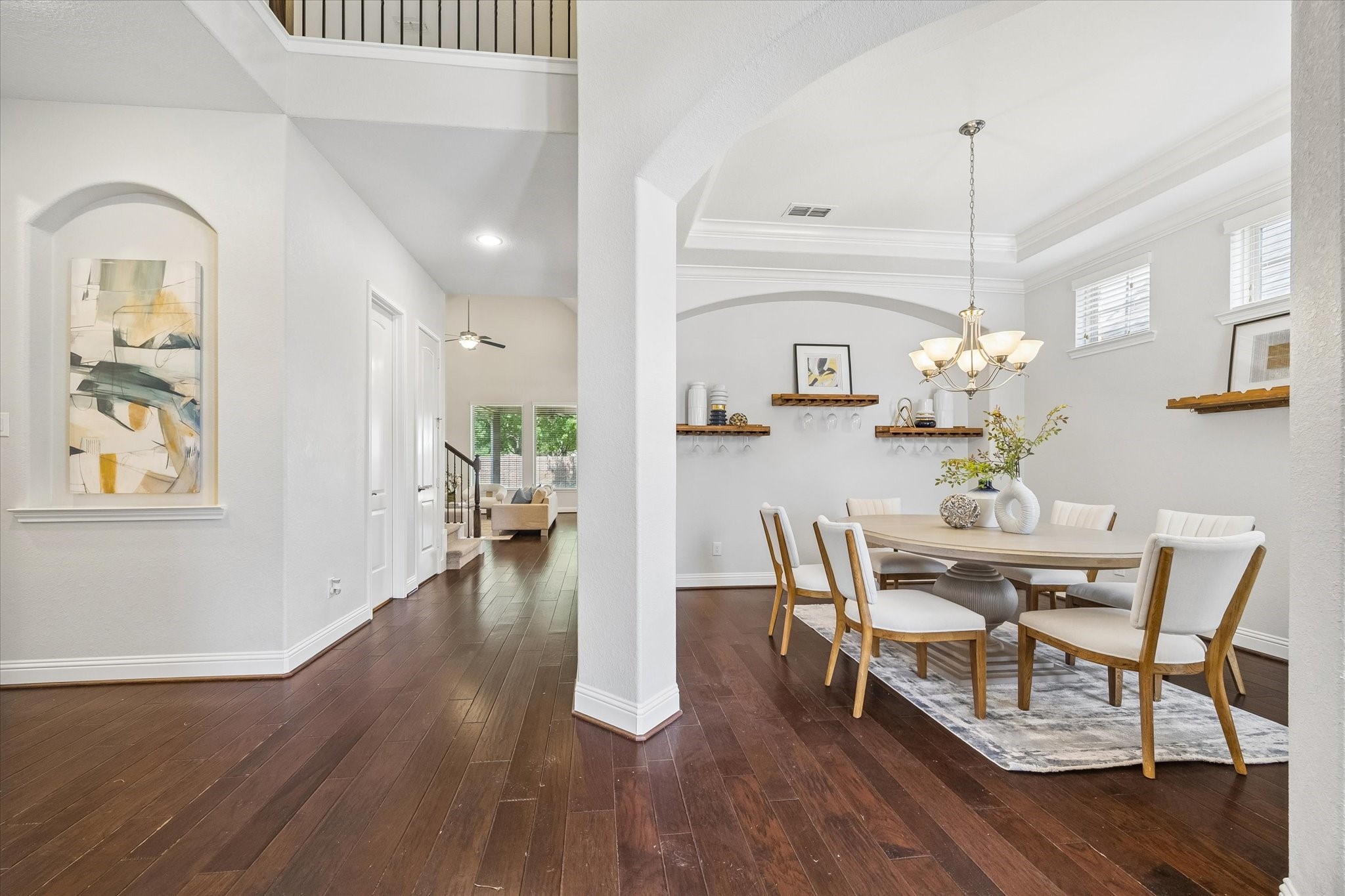 Inviting interior entryway leading to a spacious dining area ideal for family meals and entertaining Inviting interior entryway leading to a spacious dining area ideal for family meals and entertaining