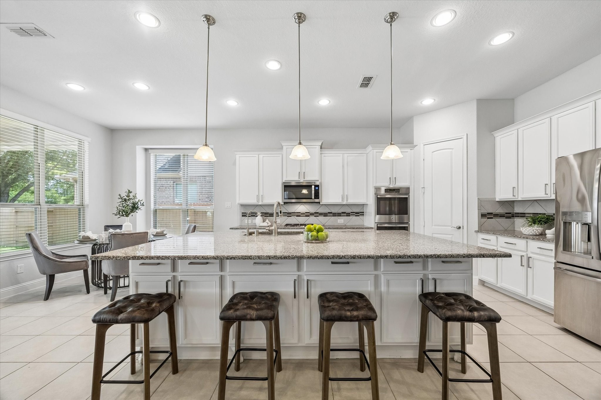 Chef's Kitchen with Large island, abundant cabinetry, and generous prep space Chef's Kitchen with Large island, abundant cabinetry, and generous prep space
