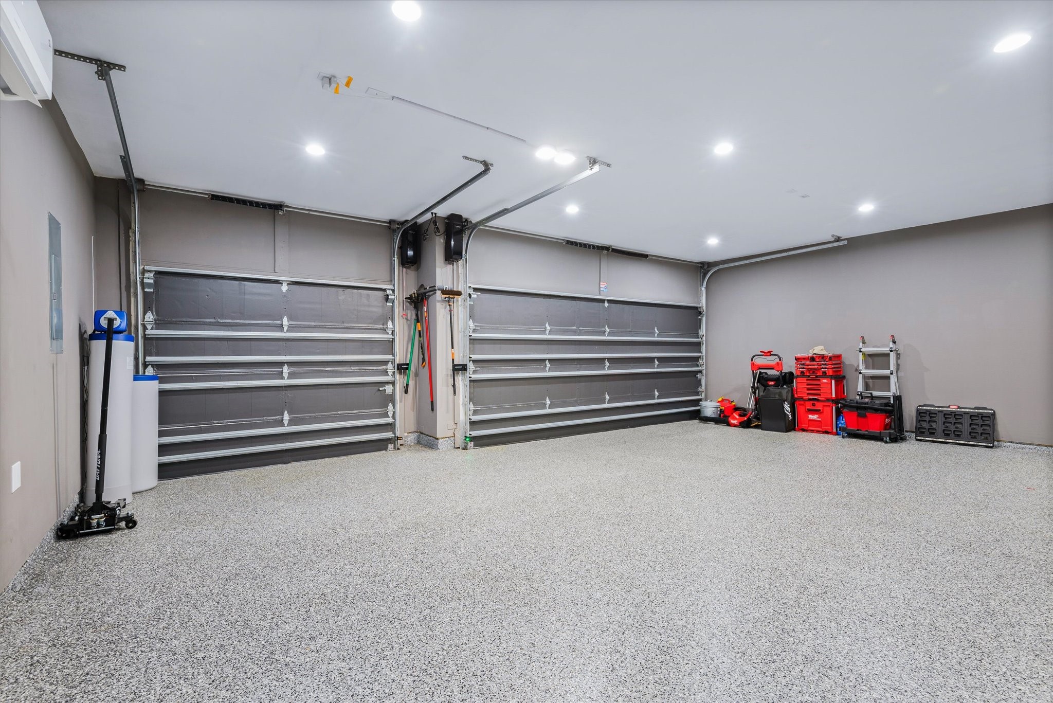 Conditioned garage space with water softener