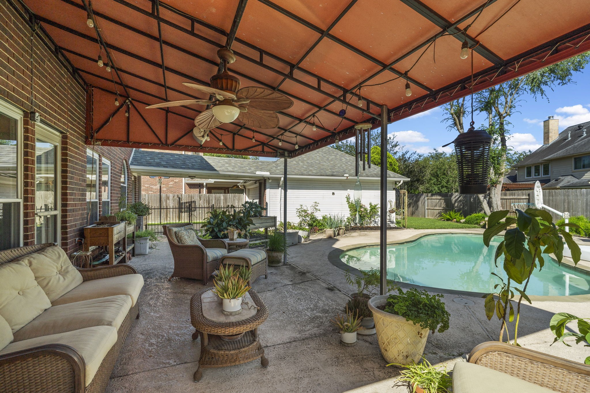 Enjoy your own private oasis with a fully fenced backyard, offering both security and a serene space to relax.