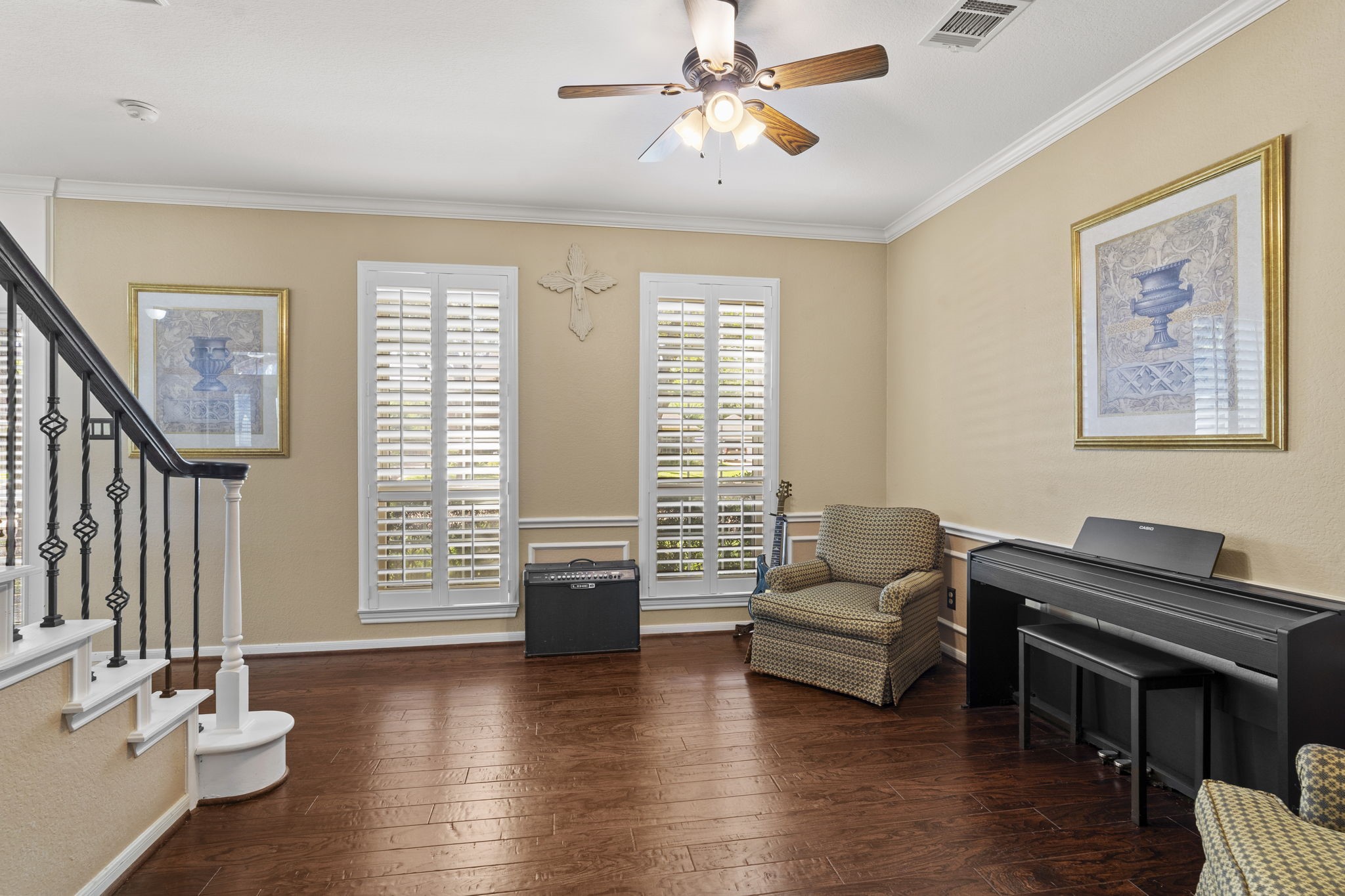 Expansive windows fill the dining room with natural light, creating a bright and inviting space.