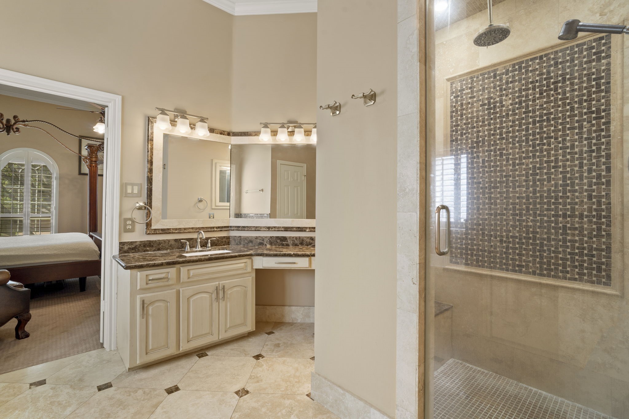 Take a peek inside the shower, complete with dual shower heads and a built-in seat.