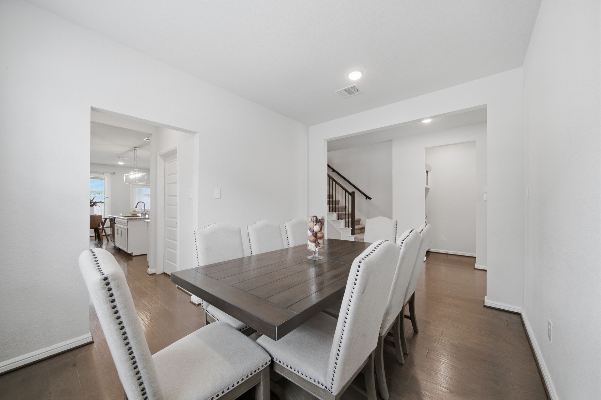 The formal dining room is located off of the foyer, next to the kitchen for easy access.