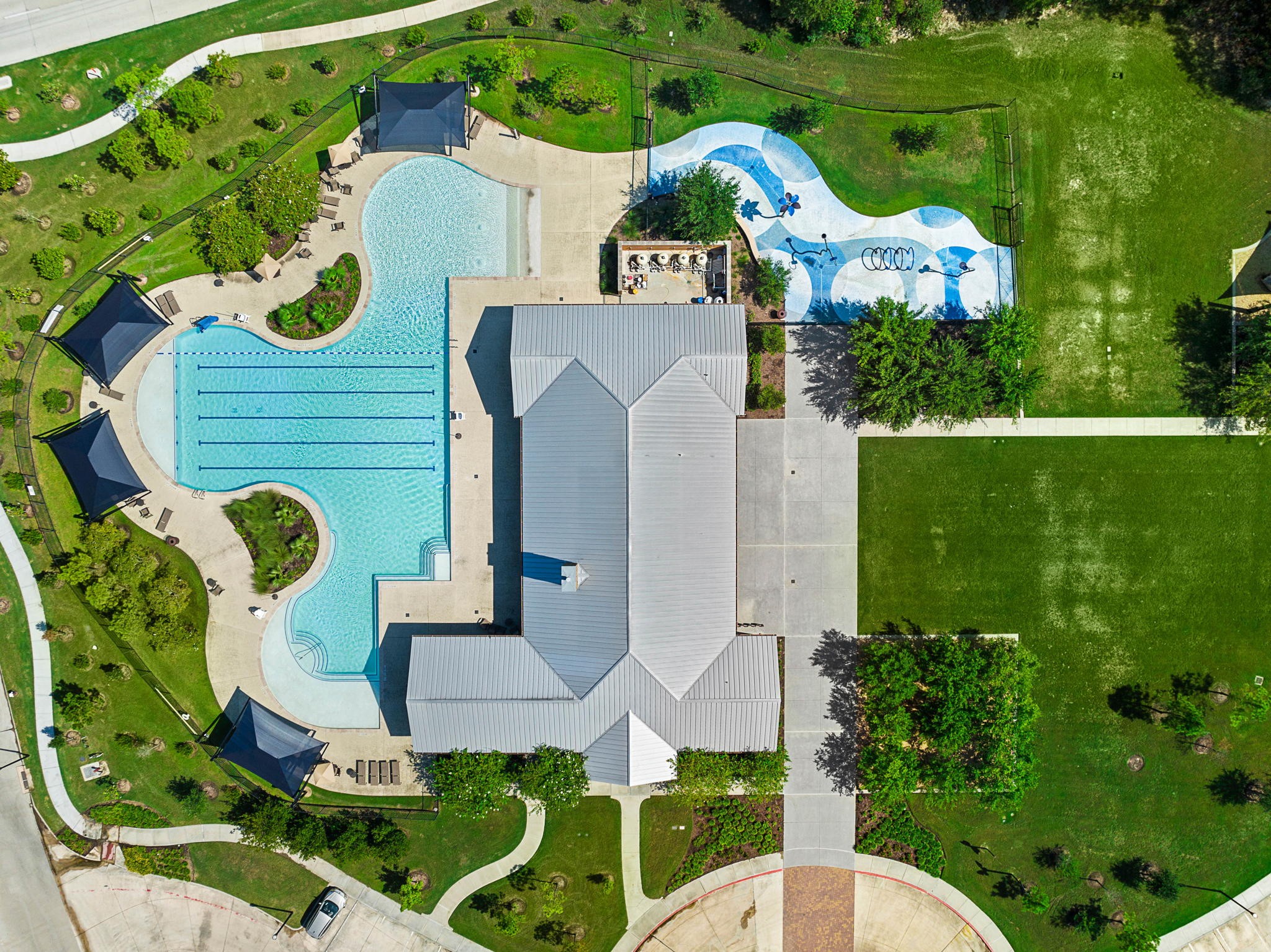 There is a splash pad located next to the clubhouse.