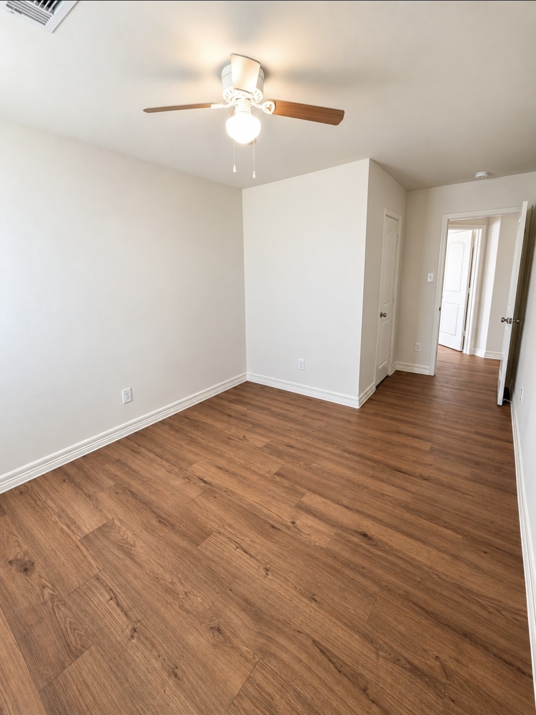 Bedroom #4 with brand-new luxury vinyl plank flooring