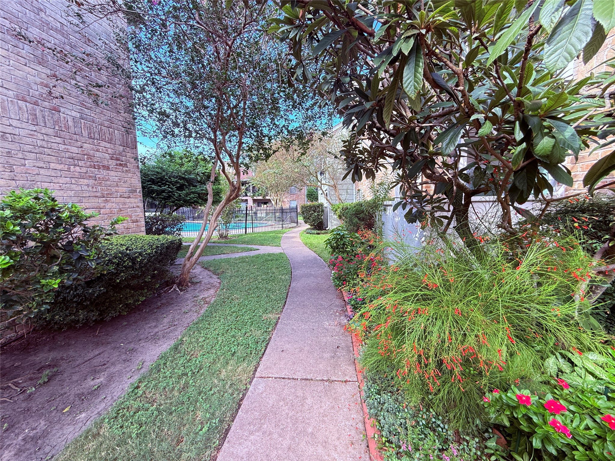 Walk to the pool right outside your front door!