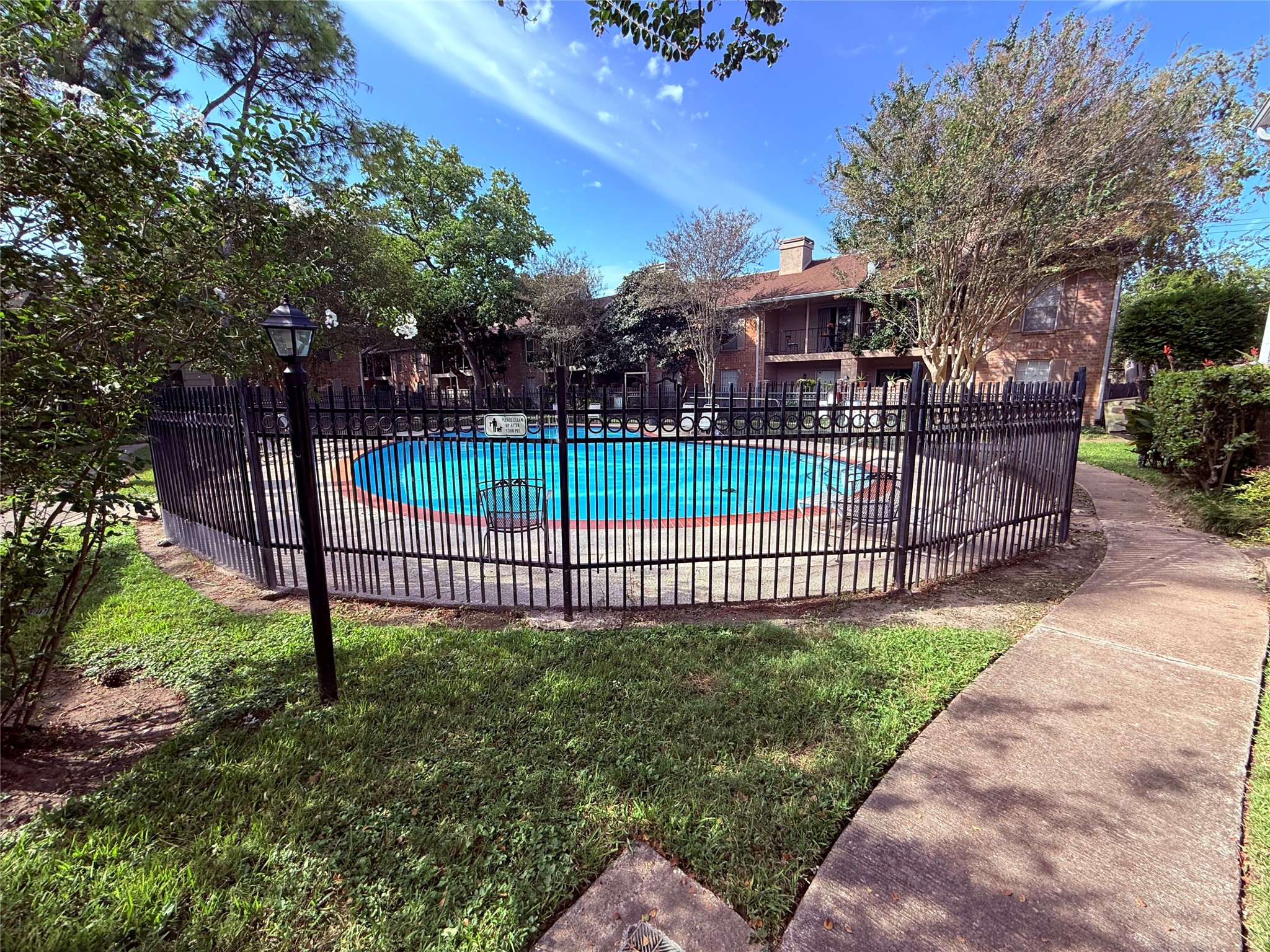 Lovely pool down the walkway from your unit!