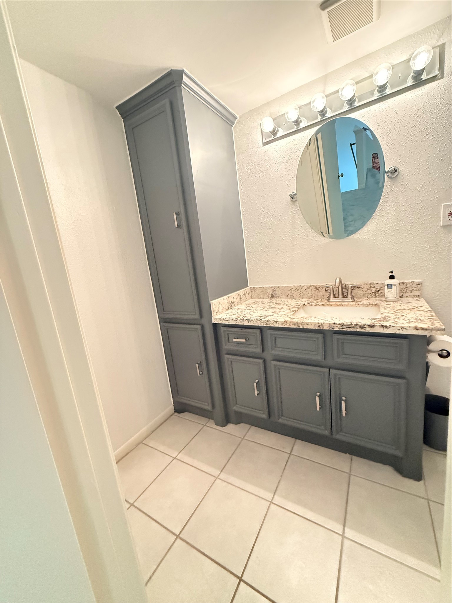 Ton's of cabinets in master bathroom!