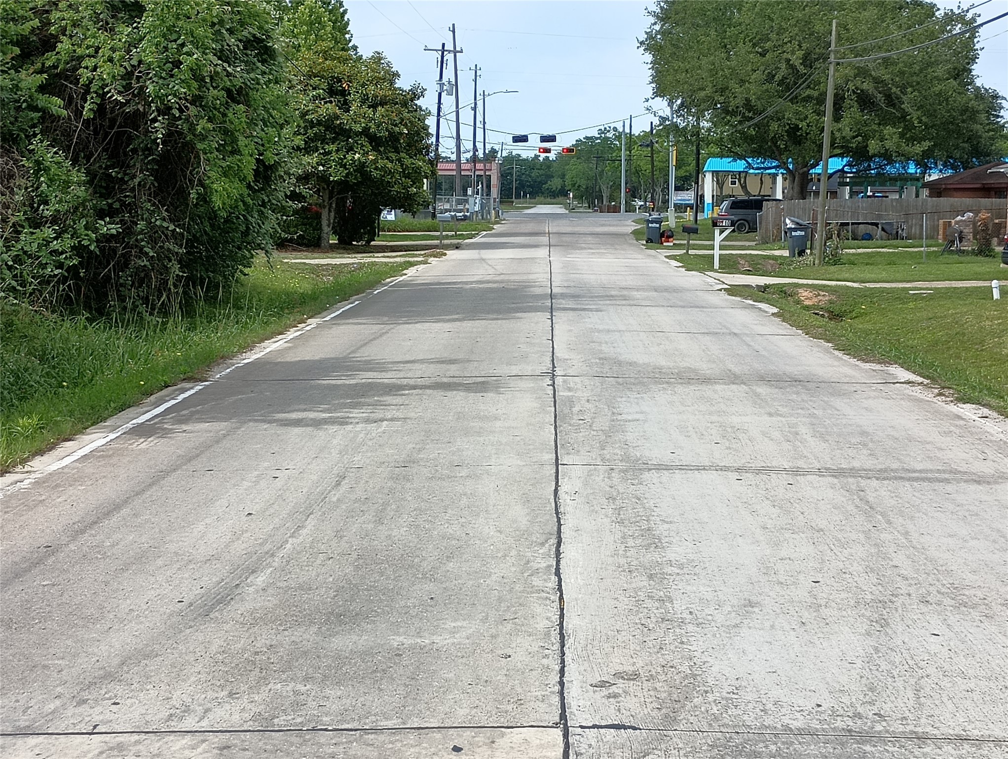 The lot on Fairwood Road is in walking distance to the church on the left located on Highway 6. Fairwood Road is a concrete road, well maintained in really good condition.