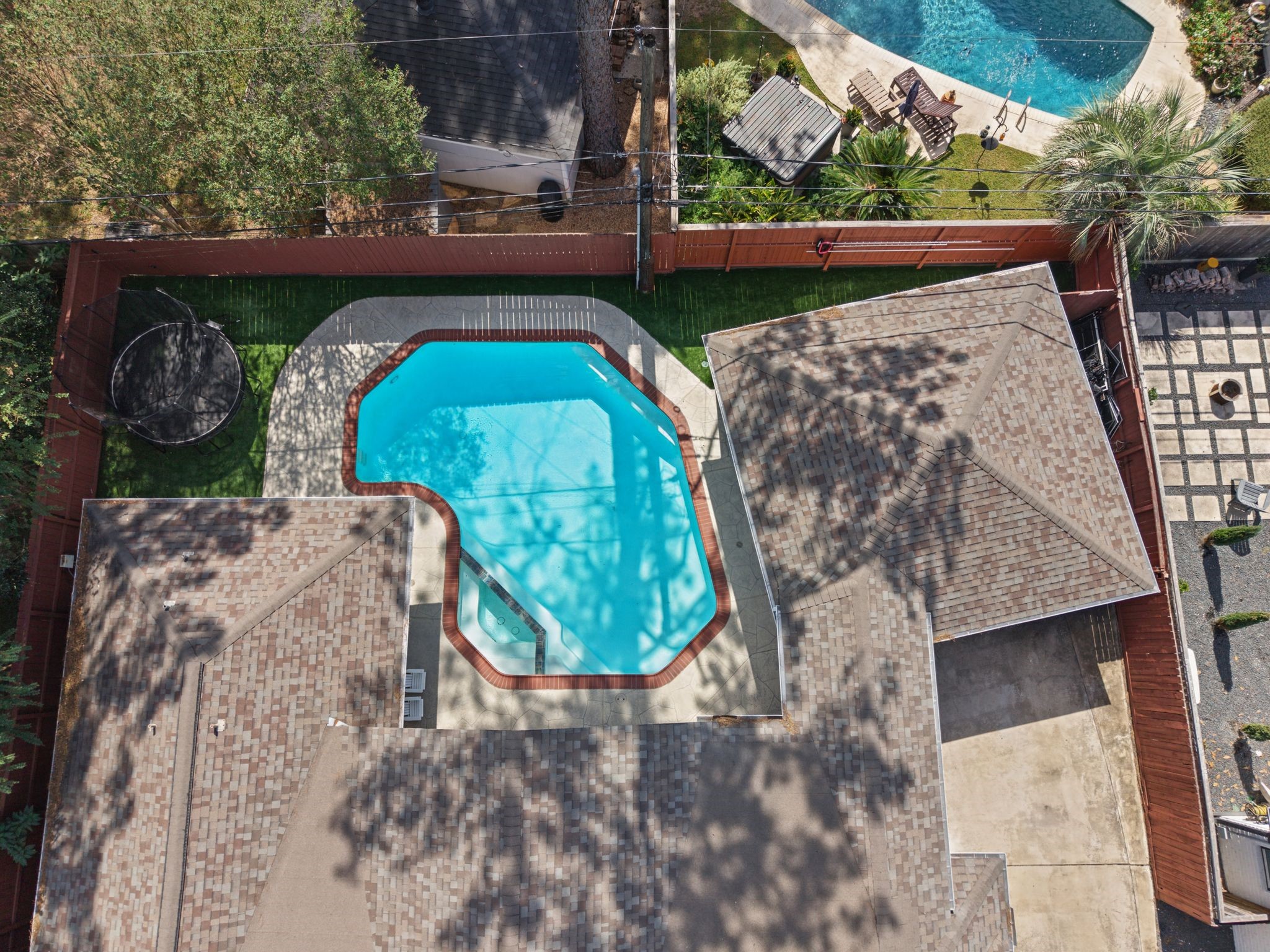 Yard features a spacious turfed play area