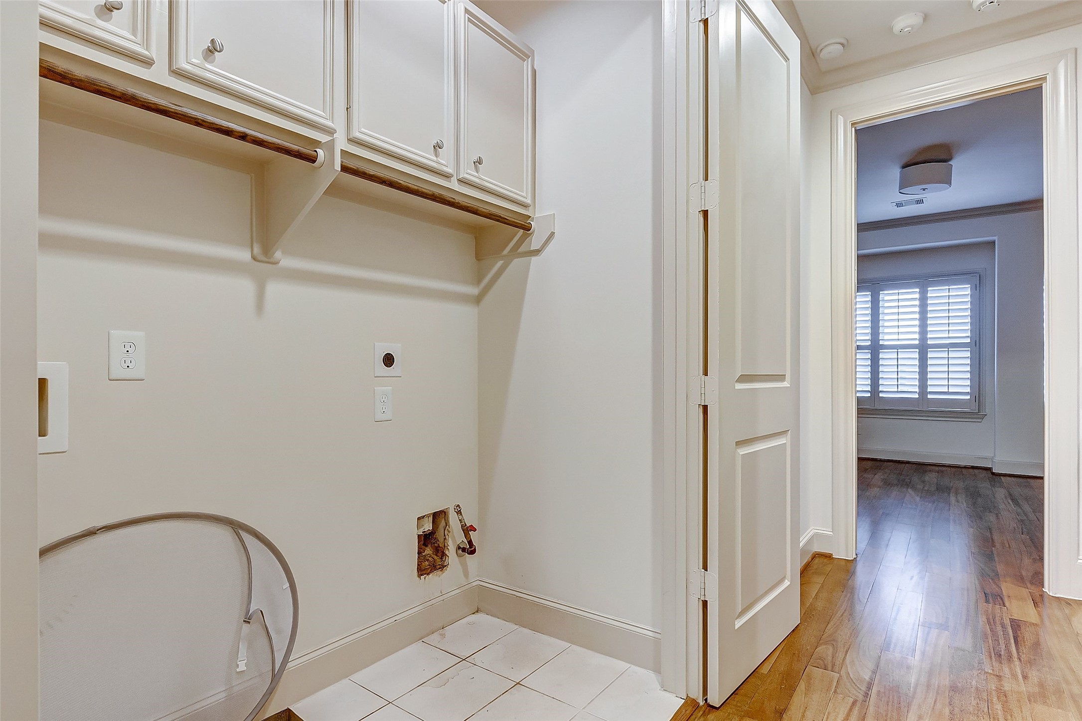 Experience ultimate convenience with the laundry closet perfectly positioned on the third floor, just steps from the primary bedroom.