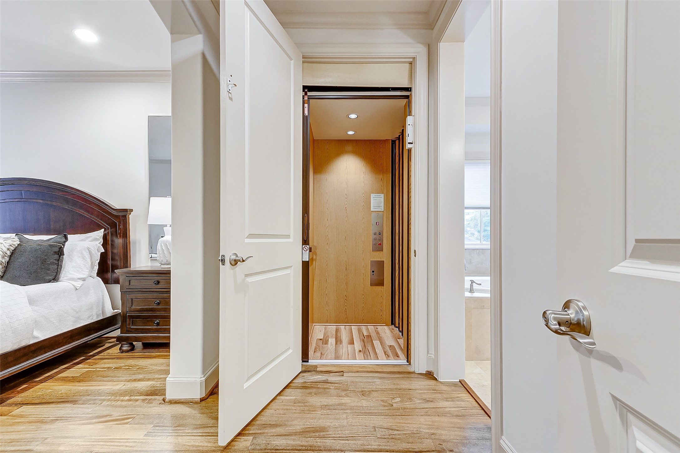 Experience unparalleled convenience in the primary bedroom with direct elevator access, making travel preparation a breezejust load your luggage and go!
