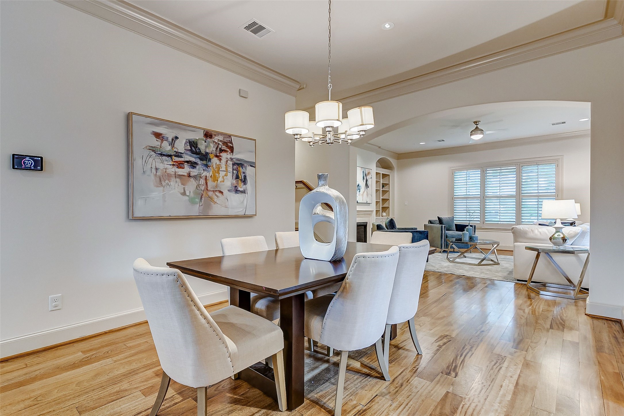 The elegant second-floor dining area offers stunning views and a warm, inviting atmosphere, ideal for memorable gatherings with loved ones.