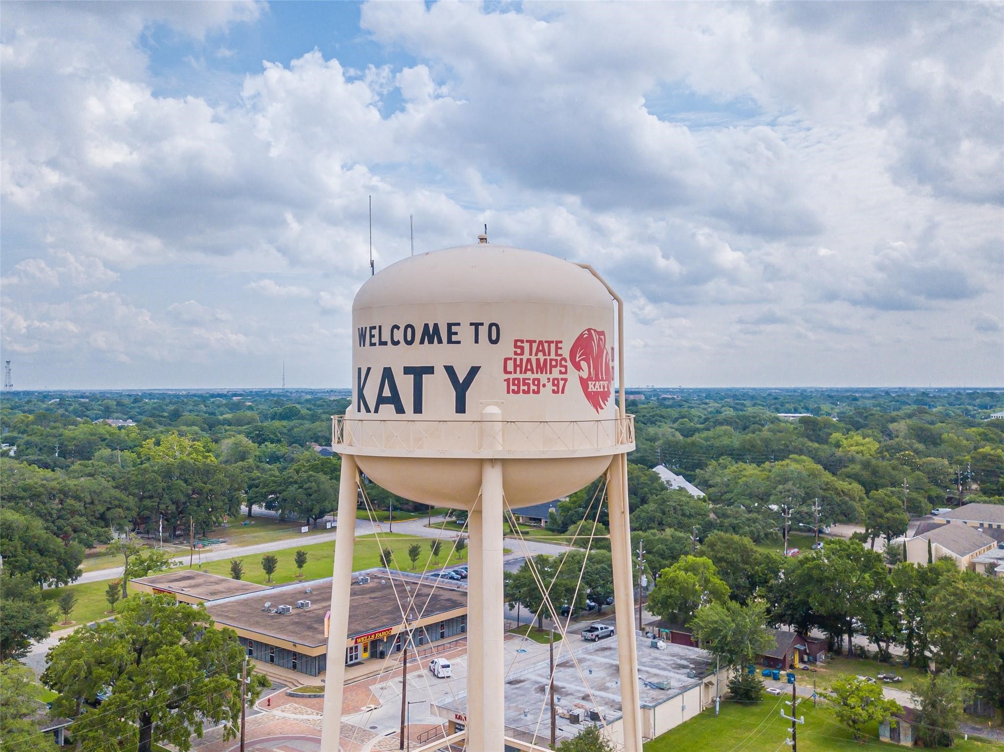 Katys iconic water tower rises above Historic Downtown Katy, where local shops, restaurants, community events, and preserved landmarks give the Old Town Katy area its distinctive small-town character.