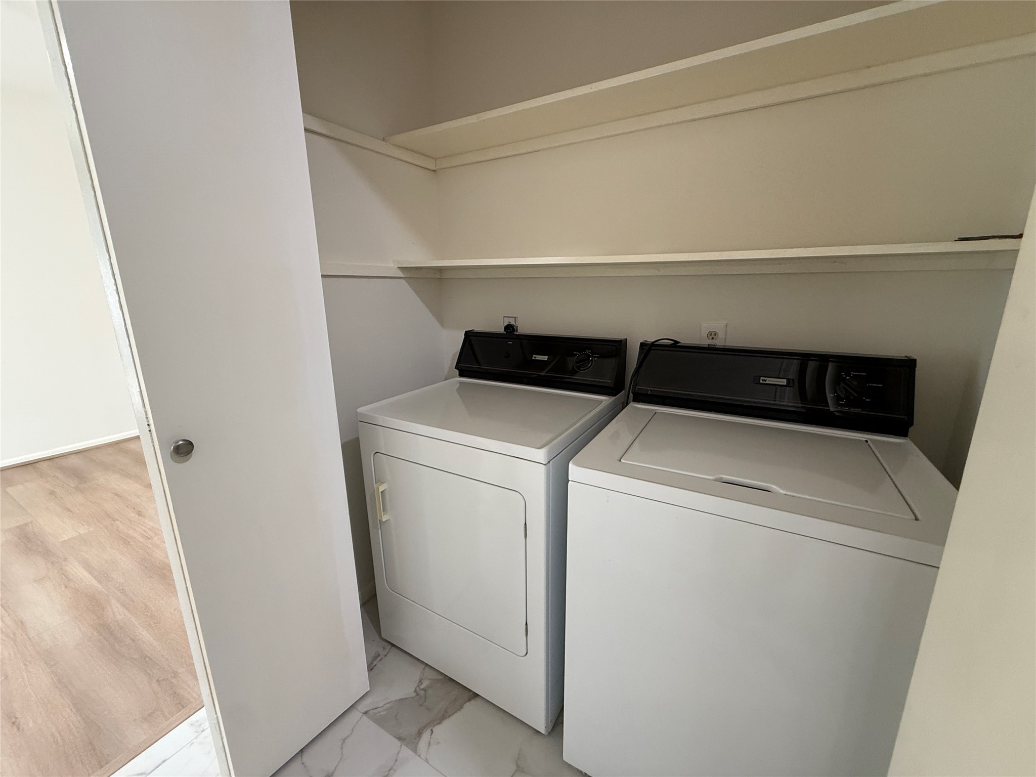 Laundry area with washer & dryer.