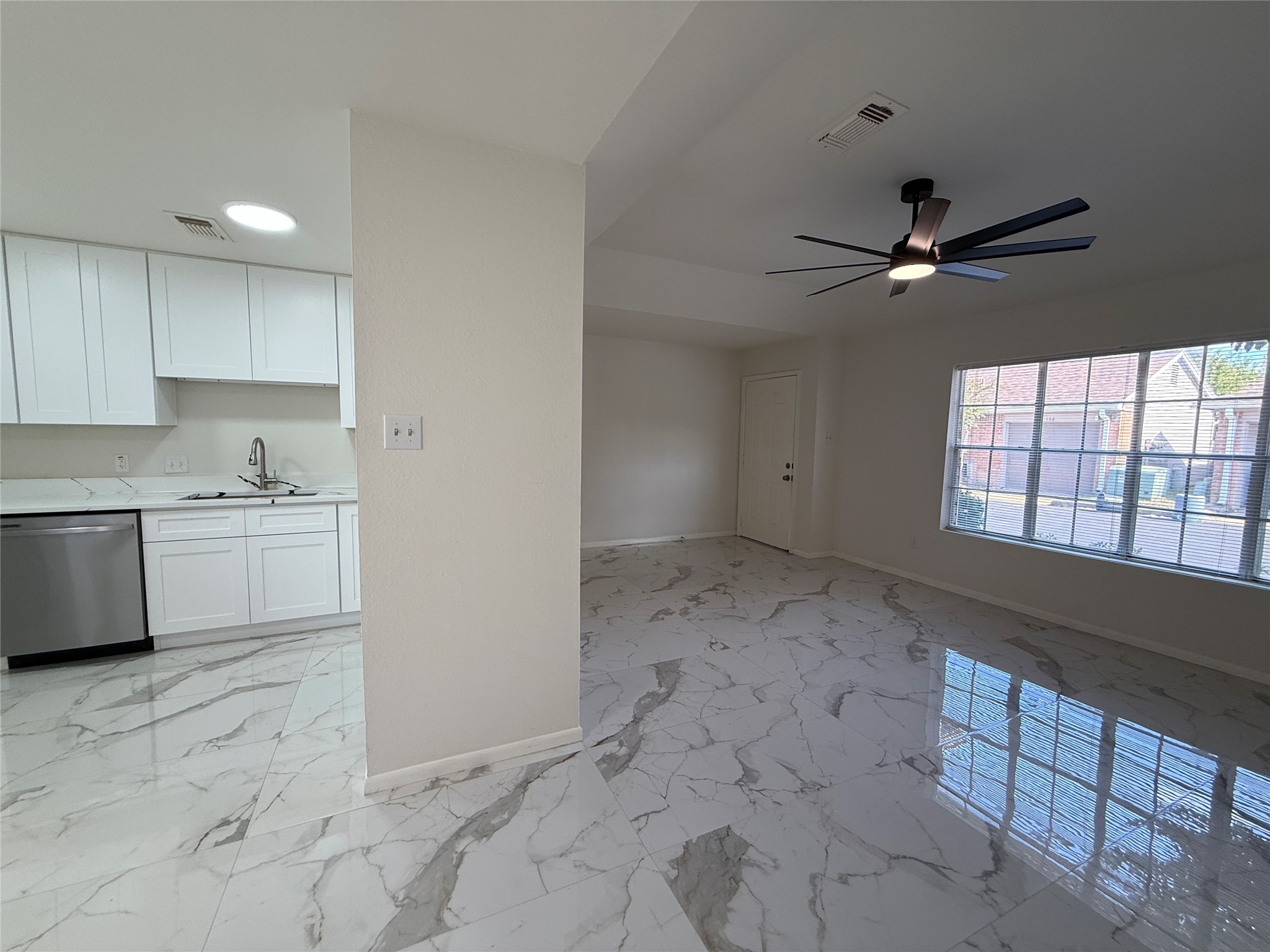 Open floor plan with quartz like tile floors. Open floor plan with quartz like tile floors.