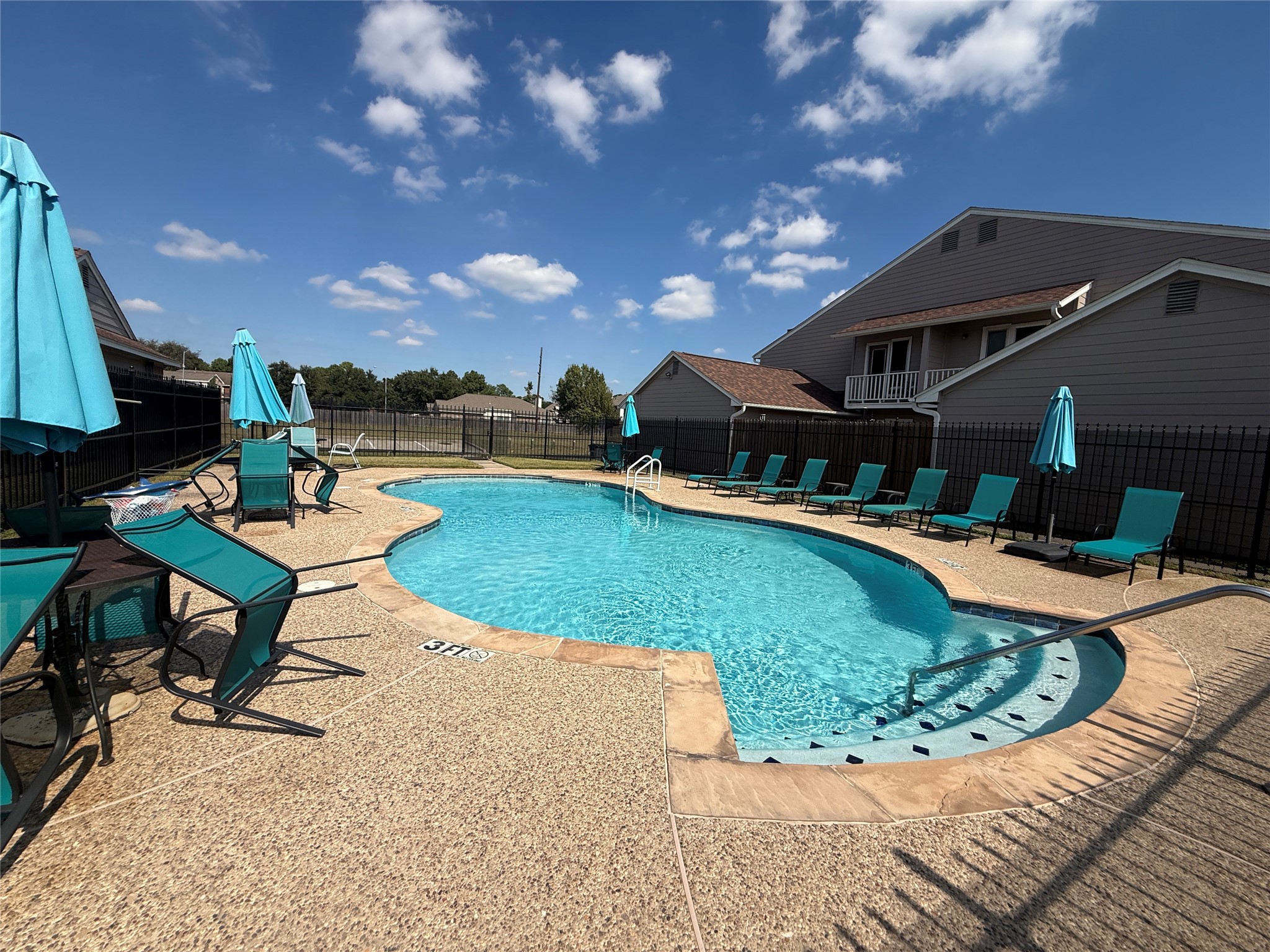 Resurfaced pool open to all residents.
