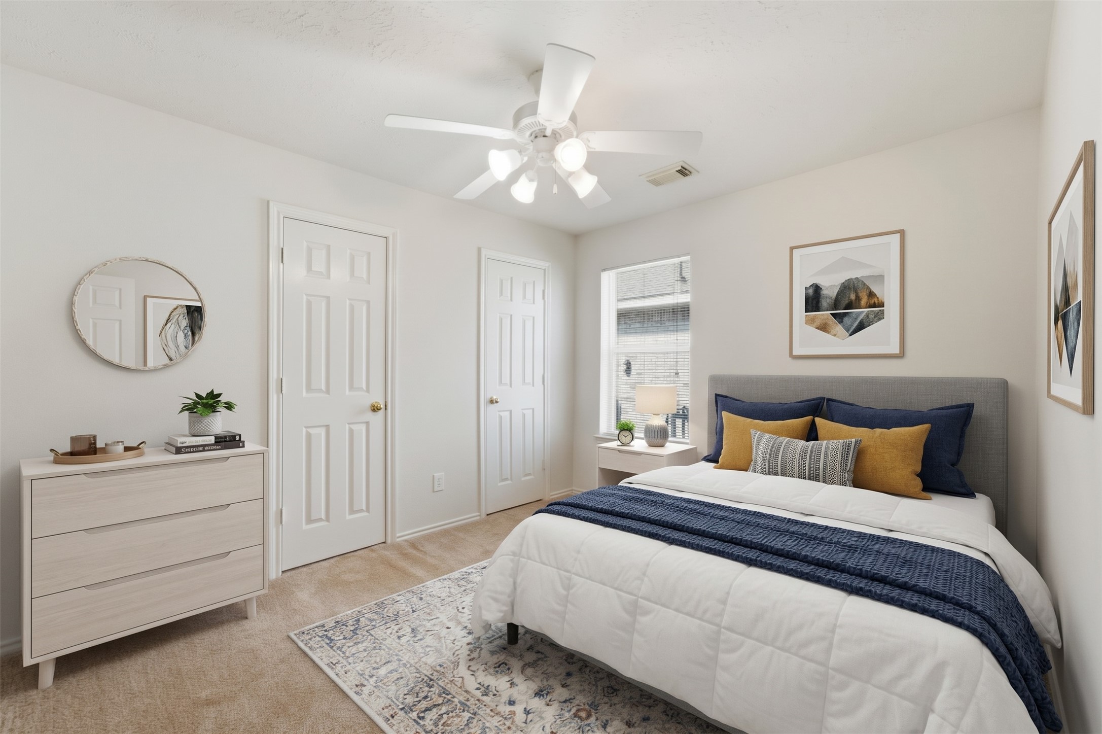 secondary bedroom complete with neutral carpeting, lighted ceiling fan, and dedicated closet space.