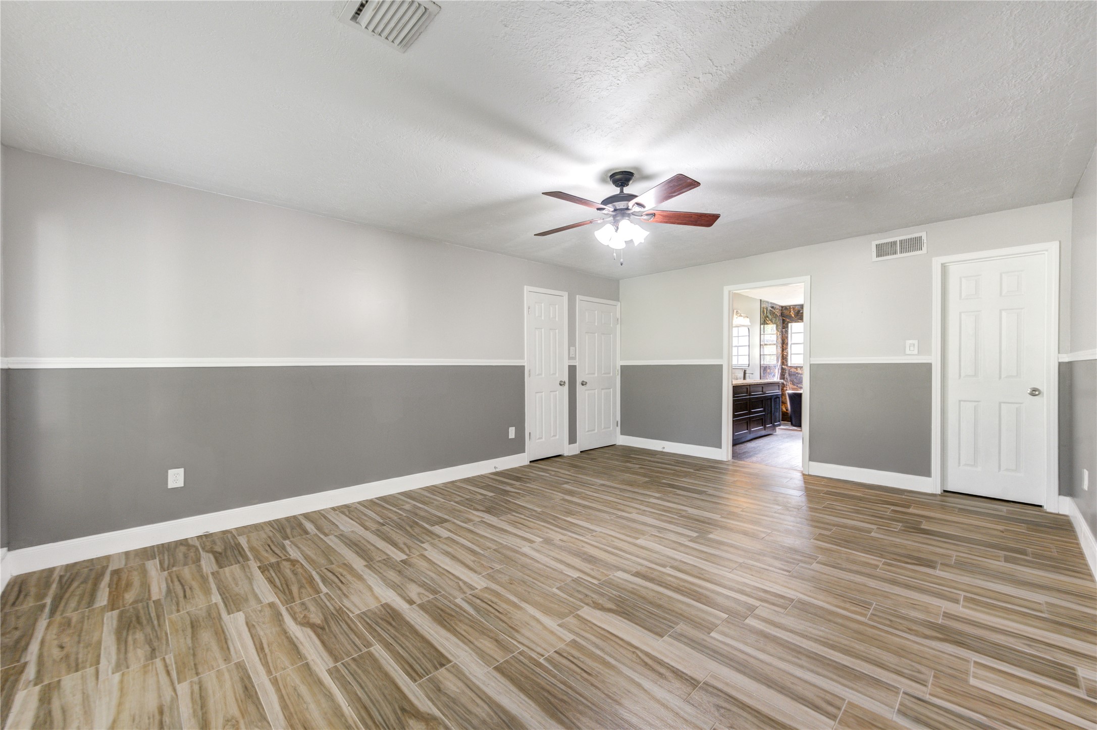 Primary Suite with Dual Walk-in Closets