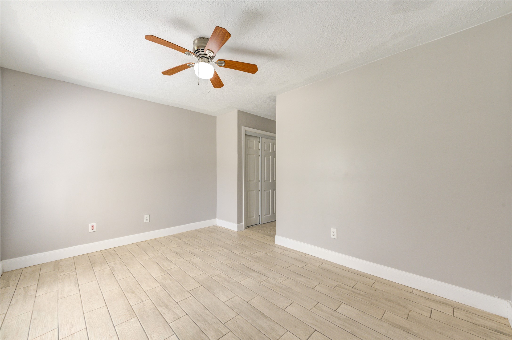 First-Floor Guest Bedroom with Walk-In Closet