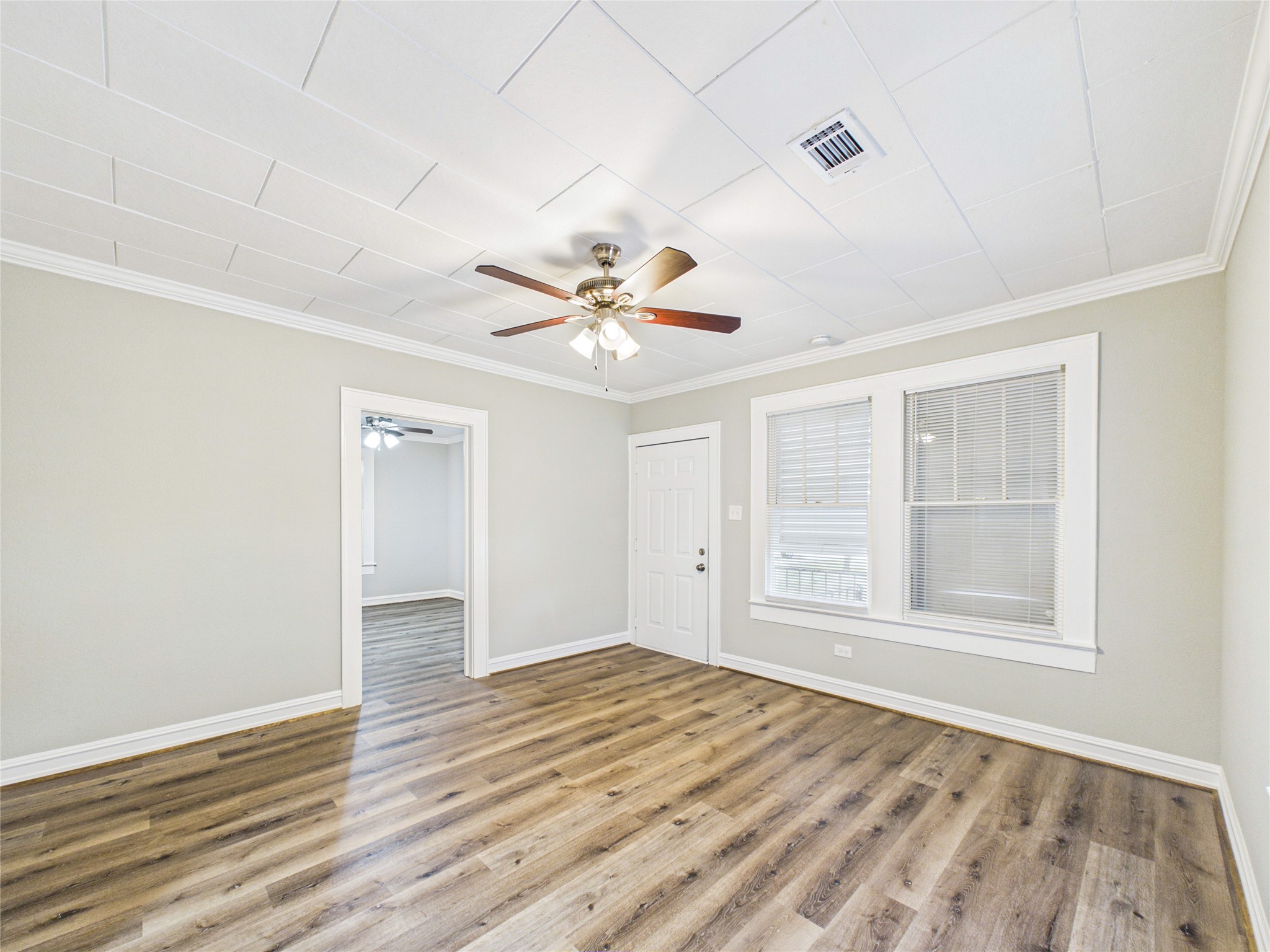 Living Room: view of the front door, and bedroom #1