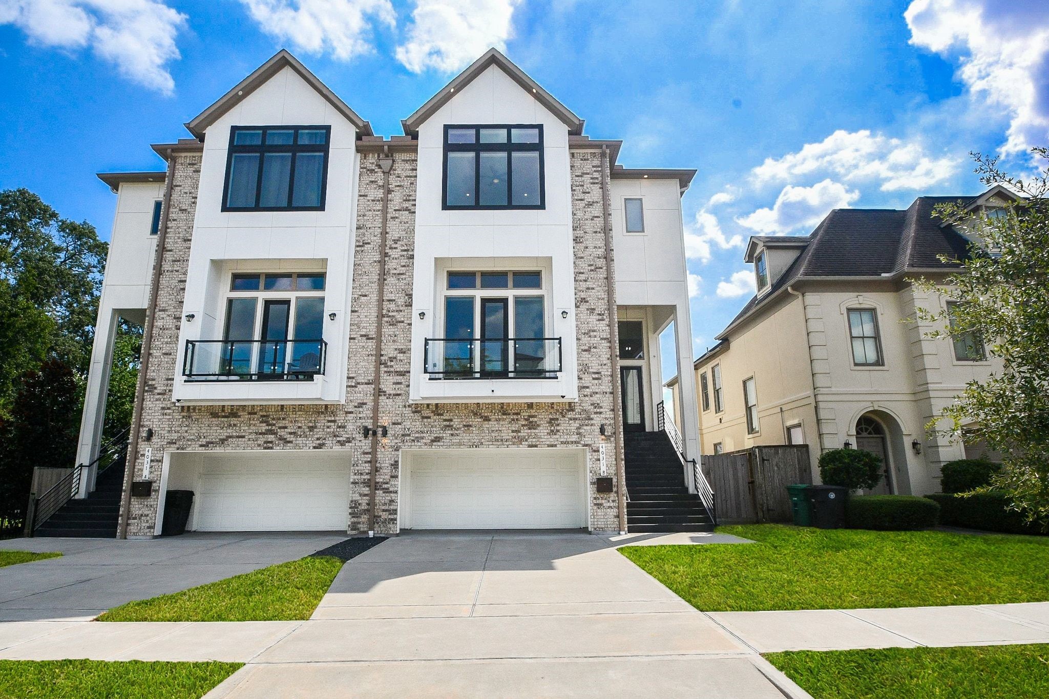 Gorgeous blue skies and warming sun create a lush natural canvas for this spectacular contemporary brick jewel located at 4031 Lanark Lane, #B, Houston, TX, in the highly desired Braes Heights neighborhood. Inside, are 4 bedrooms, 4-1/2 baths, all gracing a generous 4,725 square-foot-lot with 3,669 square-feet of interior living space, including an elevator. Shown here is a 4-vehicle garage, easily accessed from inside and out. Also note extra convenient driveway space for guest and other vehicles. Gorgeous blue skies and warming sun create a lush natural canvas for this spectacular contemporary brick jewel located at 4031 Lanark Lane, #B, Houston, TX, in the highly desired Braes Heights neighborhood. Inside, are 4 bedrooms, 4-1/2 baths, all gracing a generous 4,725 square-foot-lot with 3,669 square-feet of interior living space, including an elevator. Shown here is a 4-vehicle garage, easily accessed from inside and out. Also note extra convenient driveway space for guest and other vehicles.