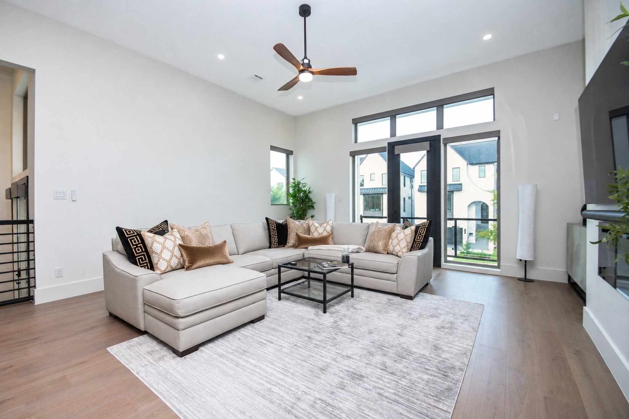 The timeless benefits and beauty of the open floor plan design concept, as appreciated in this living room view, never fails to impress for its unobstructed appearance ready to welcome your lifestyle and spatial choices.
