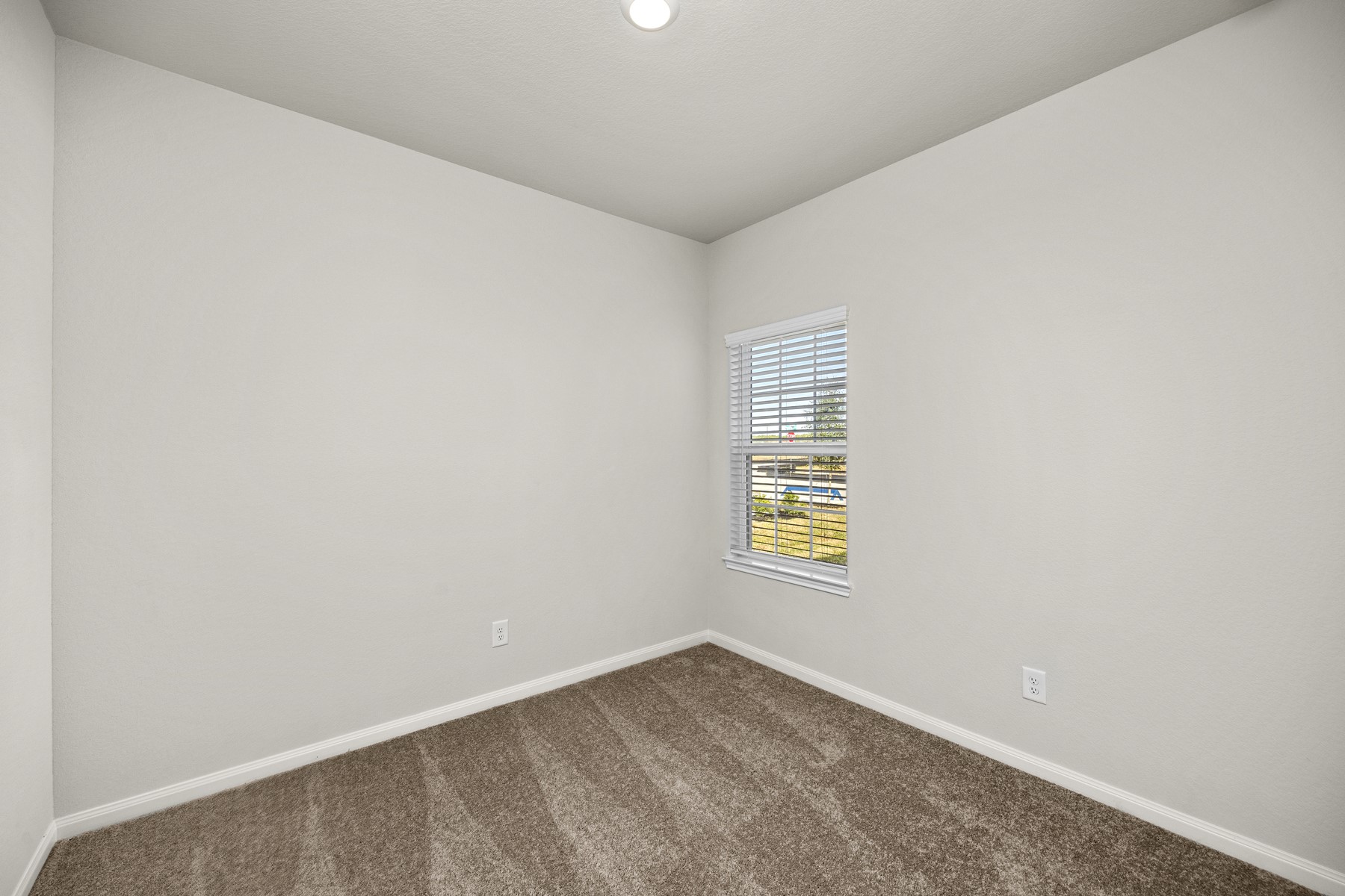 The two additional bedrooms in the home are perfect for a guest room, kids room, or home office!