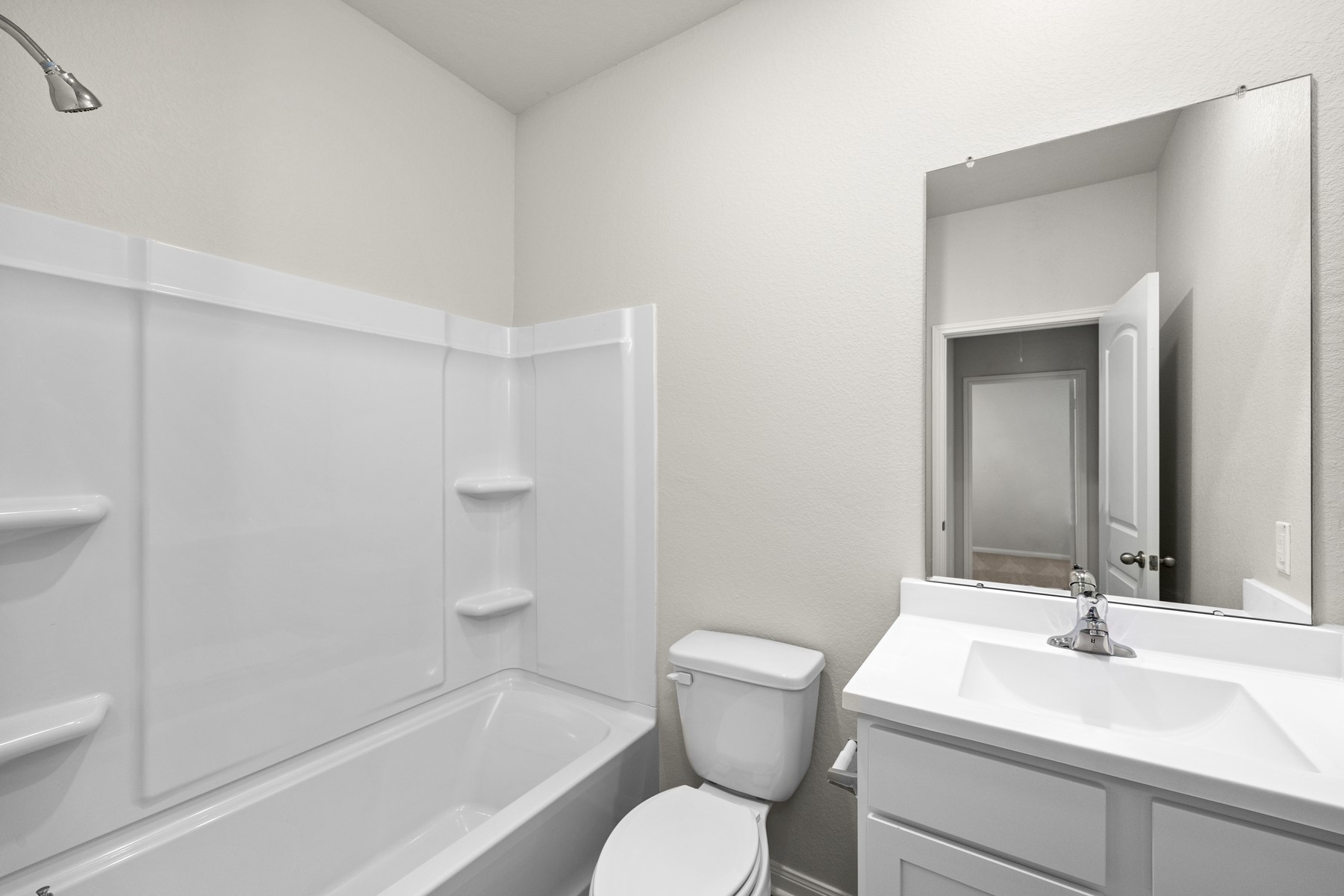 The secondary bathroom is conveniently located centrally in the home.