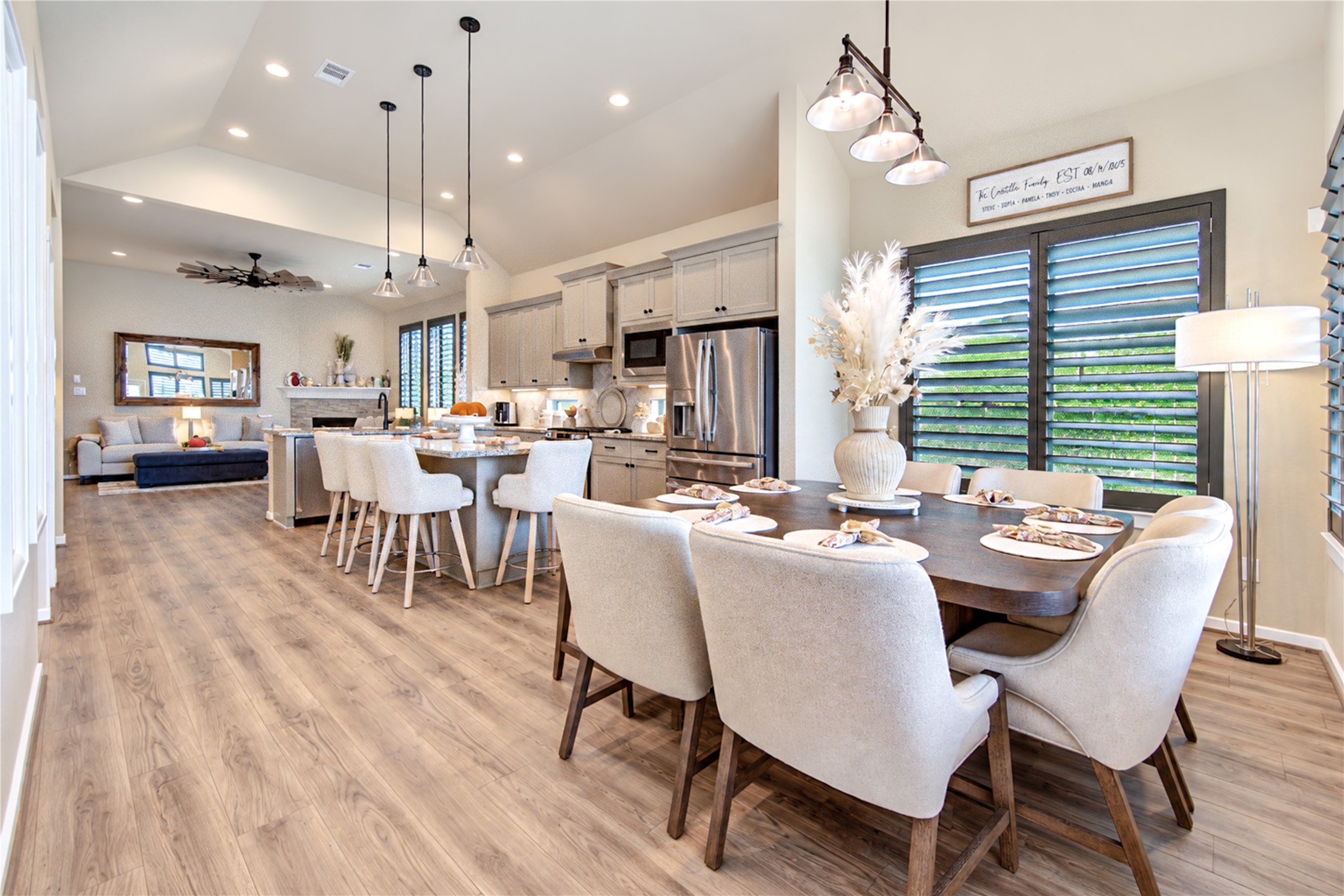 The open design connects the dining area, kitchen and family room, making the space comfortable for everyday living and entertaining.