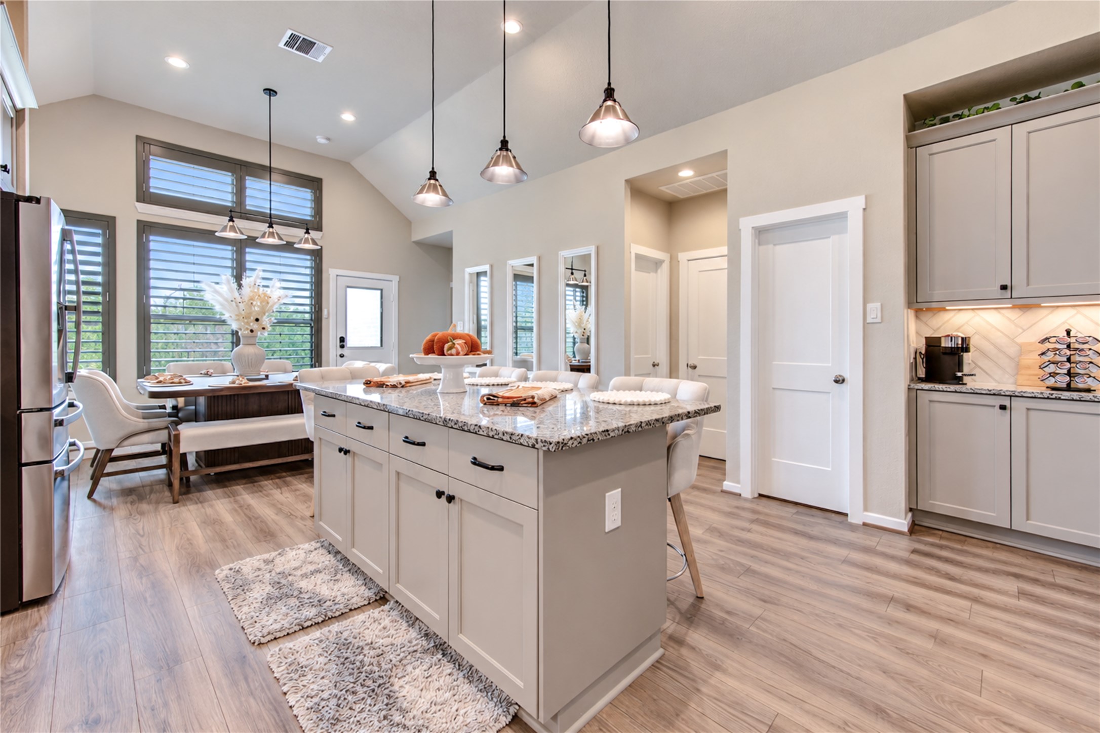The kitchen and dining area come together in an open, comfortable space designed for everyday living.