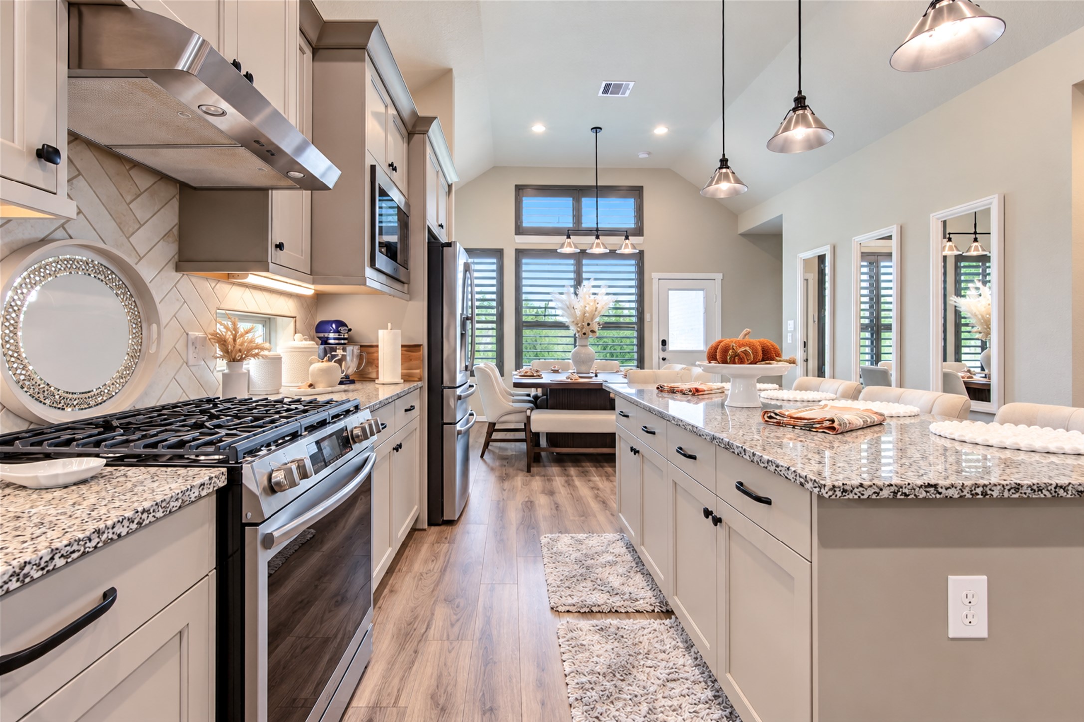 Another look at the kitchen's thoughtful layout, generous counter space and beautiful finishes.