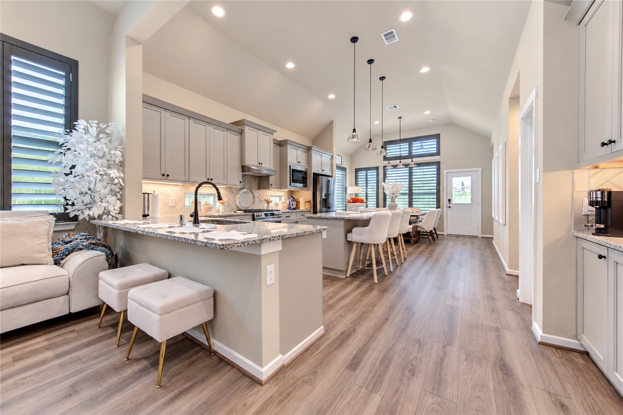 The kitchen offers plenty of workspace, beautiful cabinetry and an easy flow into the breakfast area.