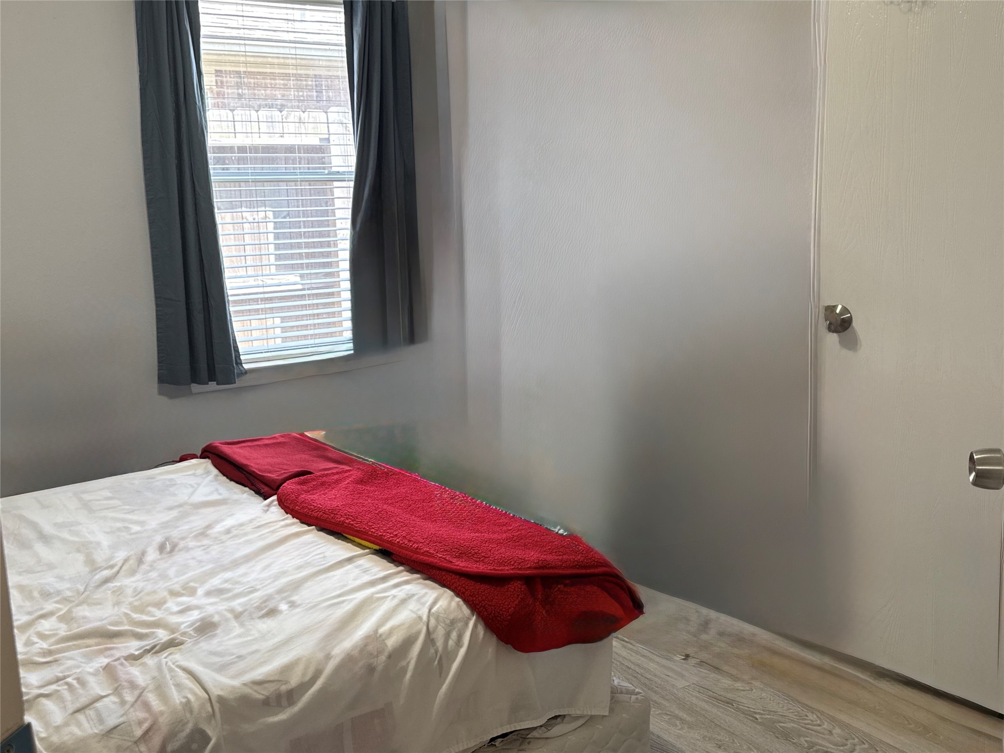 Comfortable secondary bedroom with a nicely sized closet.